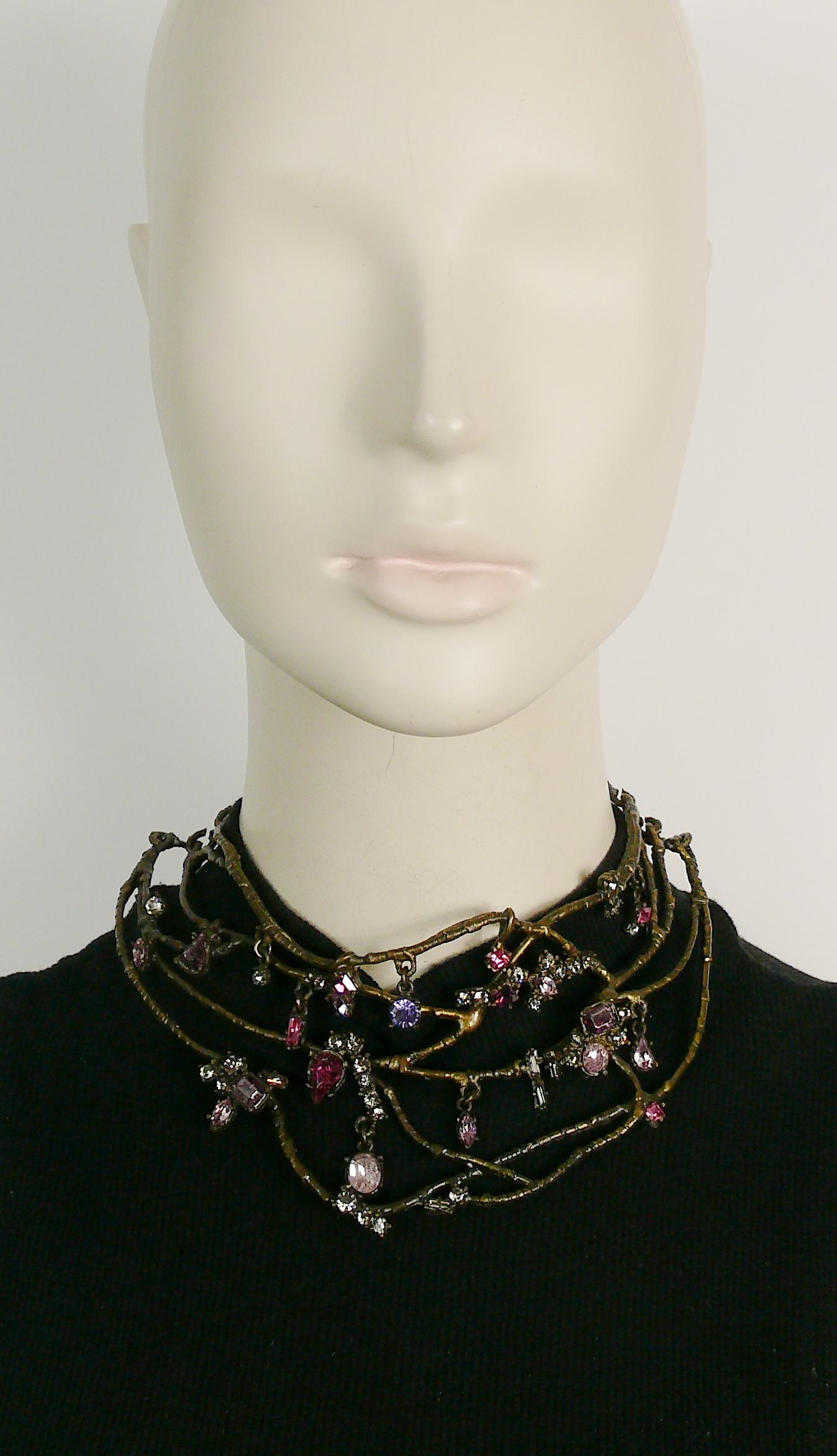 CHRISTIAN LACROIX vintage antiqued bronze toned choker necklace featuring intertwined branches embellished with multicolored crystals (some with an original cracked pattern).

T-bar closure.
Extension chain.

Marked CHRISTIAN LACROIX CL Made in