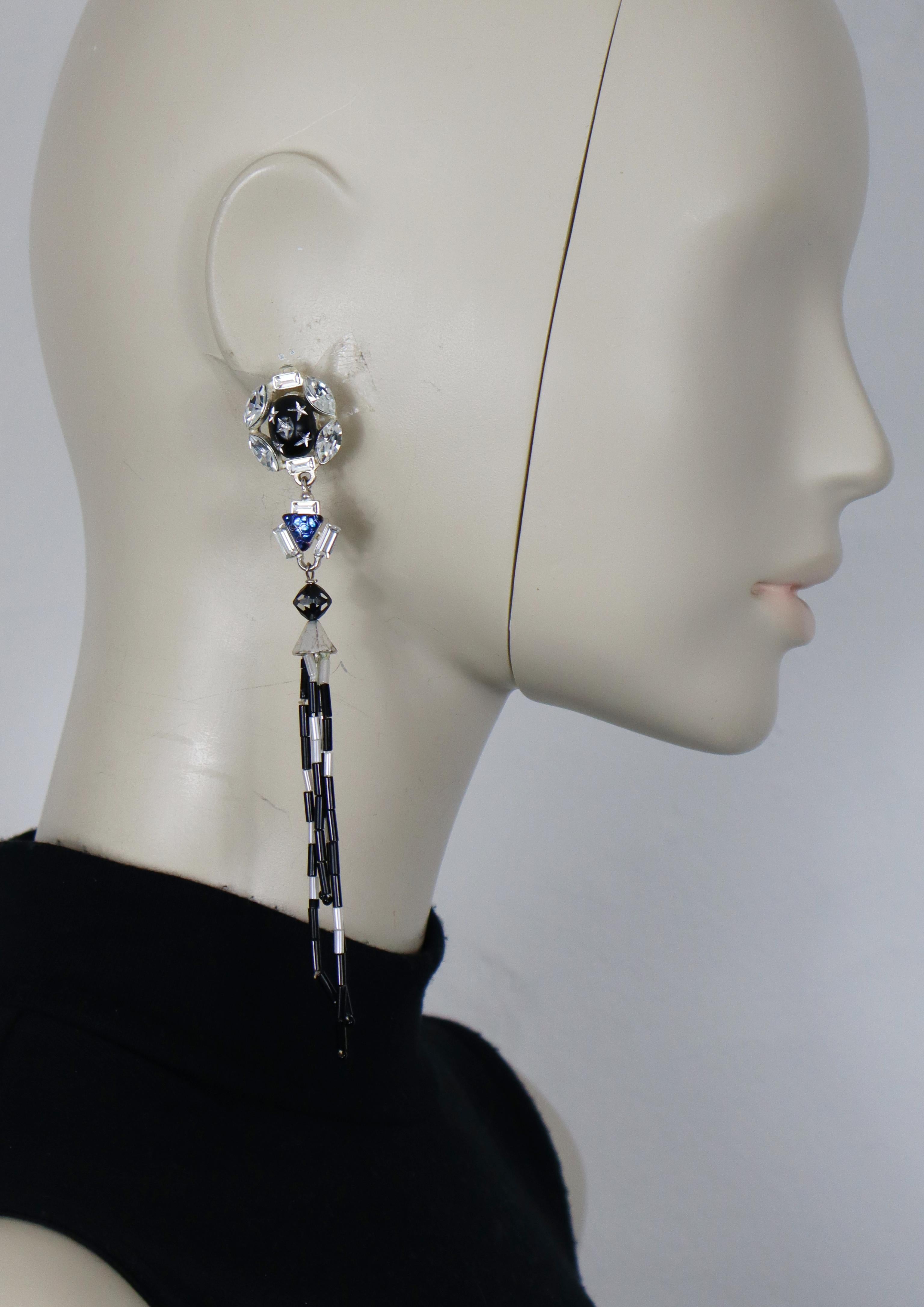 CHRISTIAN LACROIX vintage silver tone dangling earrings (clip-on) featuring a celestial resin top, crystals and beads.

Marked CHRISTIAN LACROIX CL Made in France.

Indicative measurements : max. height approx. 14.5 cm (5.71 inches) / max. width