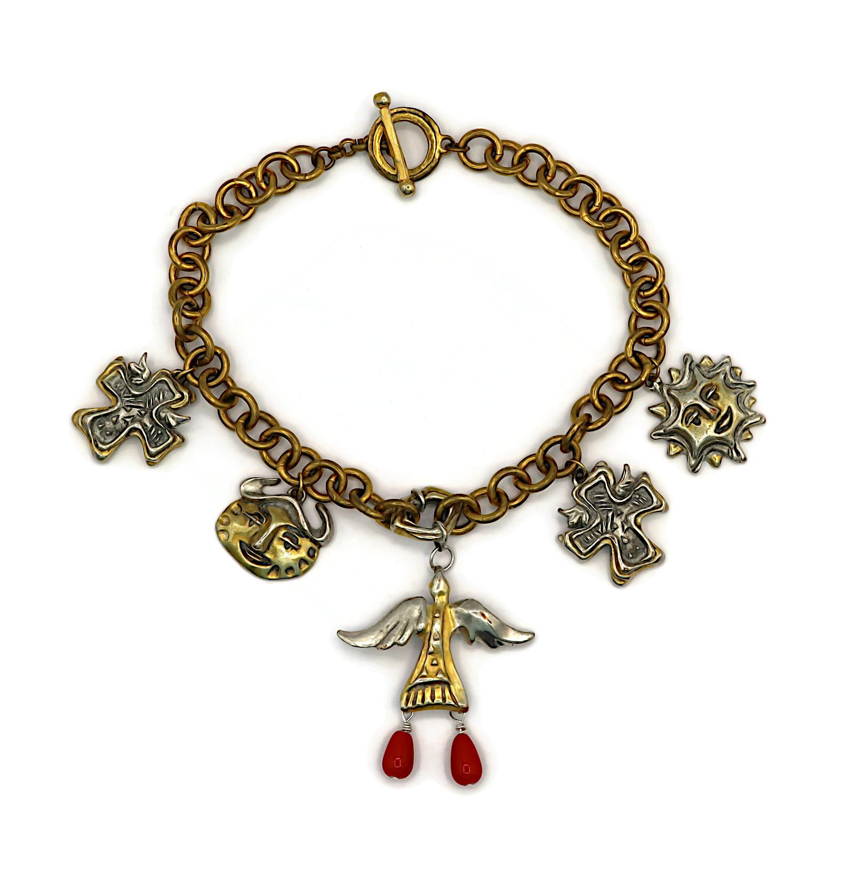 CHRISTIAN LACROIX vintage gold tone chain necklace featuring five bi-tone metal charms.

Toggle clasp.

Marked CHRISTIAN LACROIX CL Made in France.

Indicative measurements :  length approx. 39 cm (15.35 inches) / width of the link approx. 1.1 cm