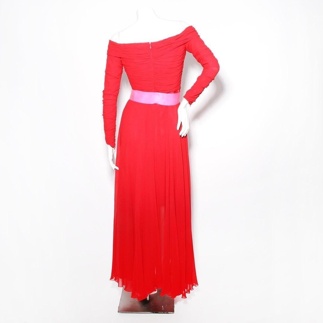 Product Details:
Vintage chiffon dress with detachable skirt by Christian Lacroix 
Early 1990's 
Red silk mini dress 
Off the shoulder dress 
Long sleeve 
Rouched top and sleeves
Zipper back with hook and eye closure 
Zipper closure on sleeve 
Snaps
