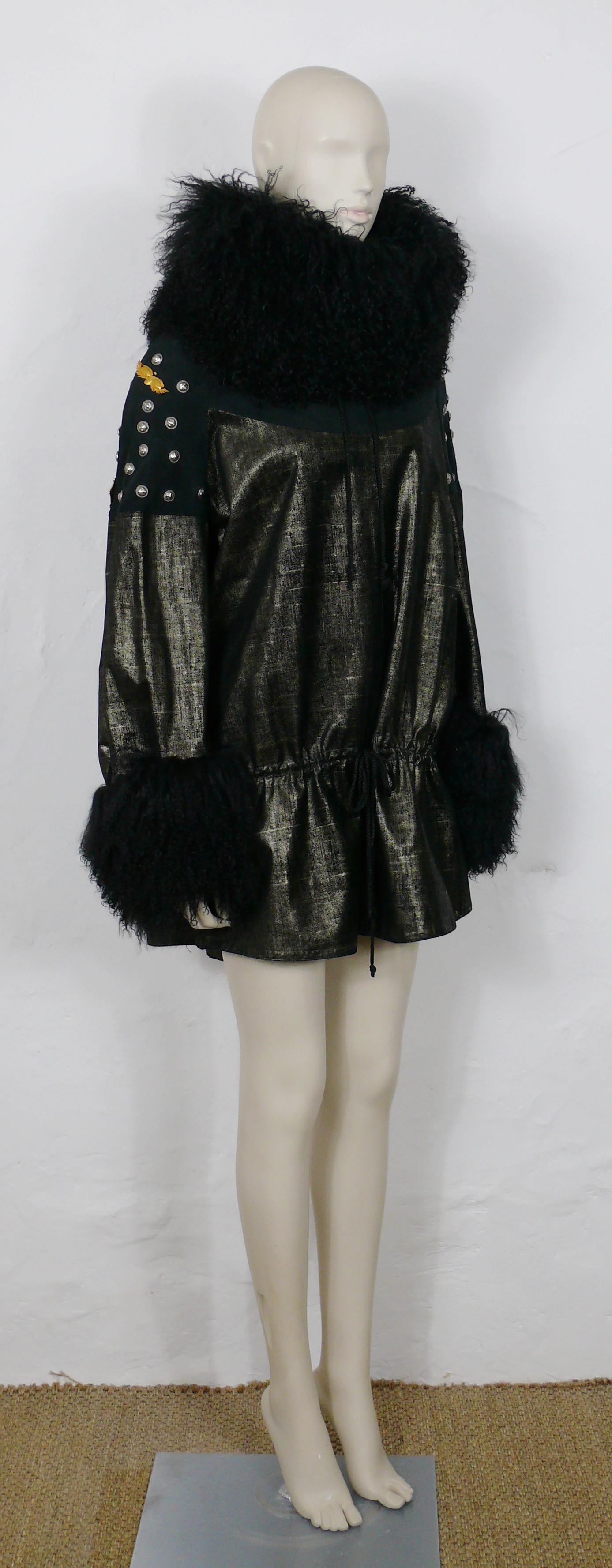 CHRISTIAN LACROIX vintage rare embellished poncho coat.

This coat features :
- Slips on.
- Drawstring waist and collar.
- Gorgeous black and golden bronze coated fabric with black suede details on shoulders, upper bust/back.
- Opulent mongolian