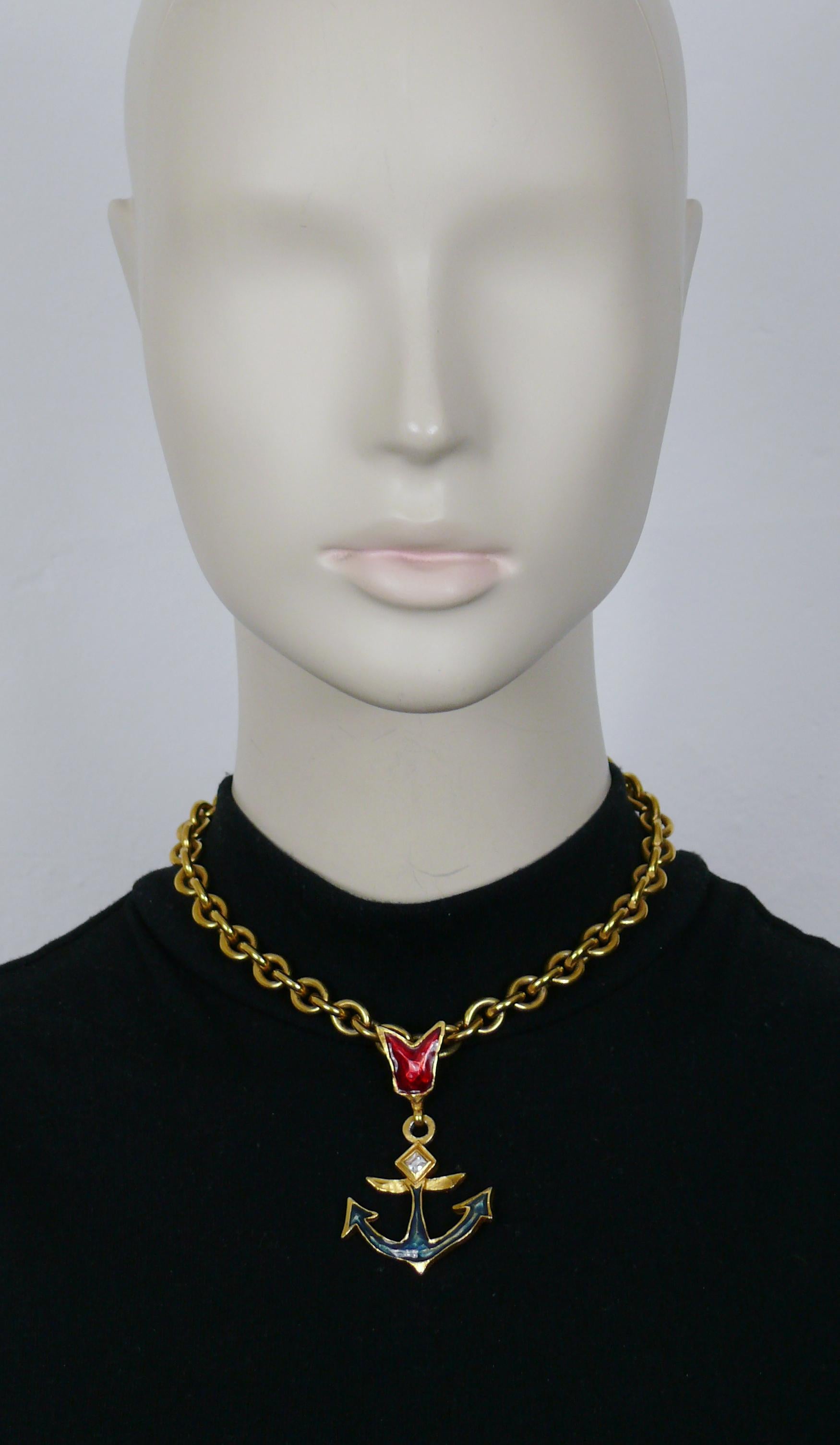 CHRISTIAN LACROIX vintage gold tone chain necklace featuring a enameled anchor pendant.

Adjustable hook clasp closure.

Marked CHRISTIAN LACROIX CL Made in France.

Indicative measurements : chain length from approx. 35.5 cm (13.98 inches) to
