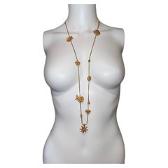 CHRISTIAN LACROIX vintage gold extra long charm necklace 