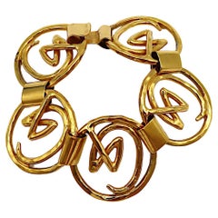 CHRISTIAN LACROIX Bracciale Vintage con Logo Iconico in tonalità oro