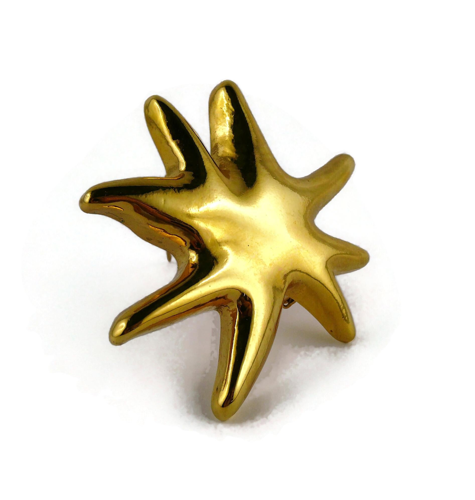 Women's Christian Lacroix Vintage Gold Toned Resin Iconic Starburst Brooch For Sale
