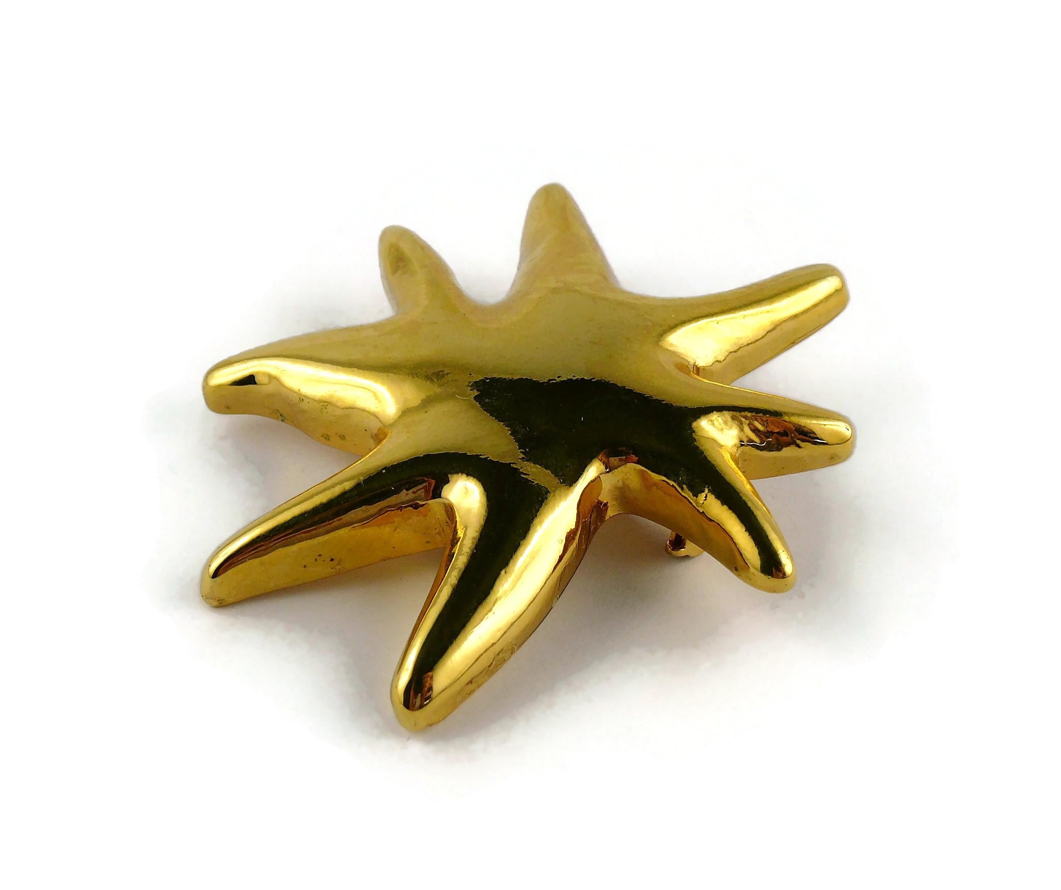 Christian Lacroix Vintage Gold Toned Resin Iconic Starburst Brooch For Sale 2