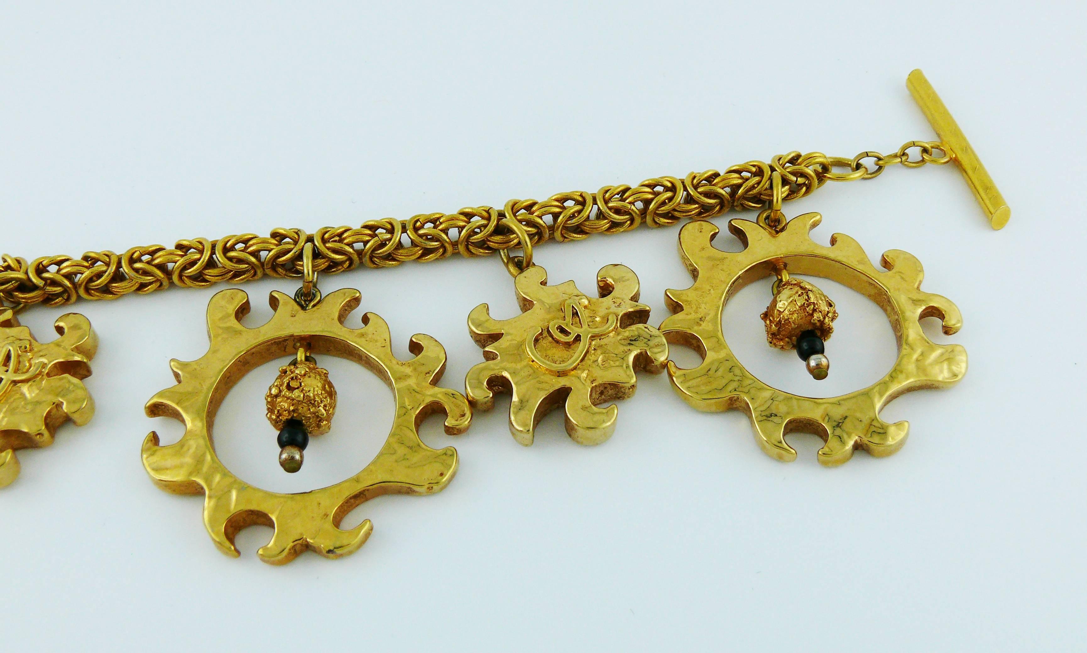 Christian Lacroix Vintage Gold Toned Sun Charms Bracelet In Good Condition For Sale In Nice, FR