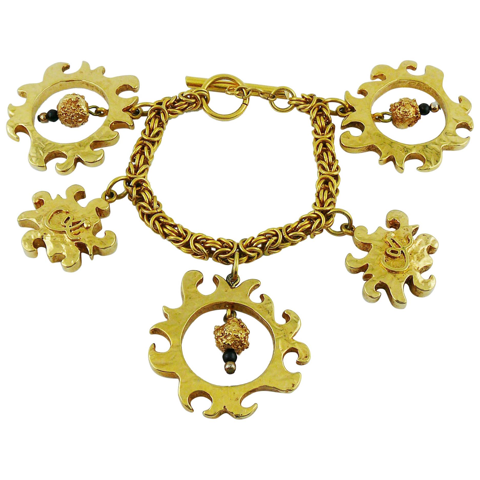 Christian Lacroix Vintage Gold Toned Sun Charms Bracelet For Sale