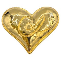 CHRISTIAN LACROIX Broche cœur vintage en métal doré en forme de cœur