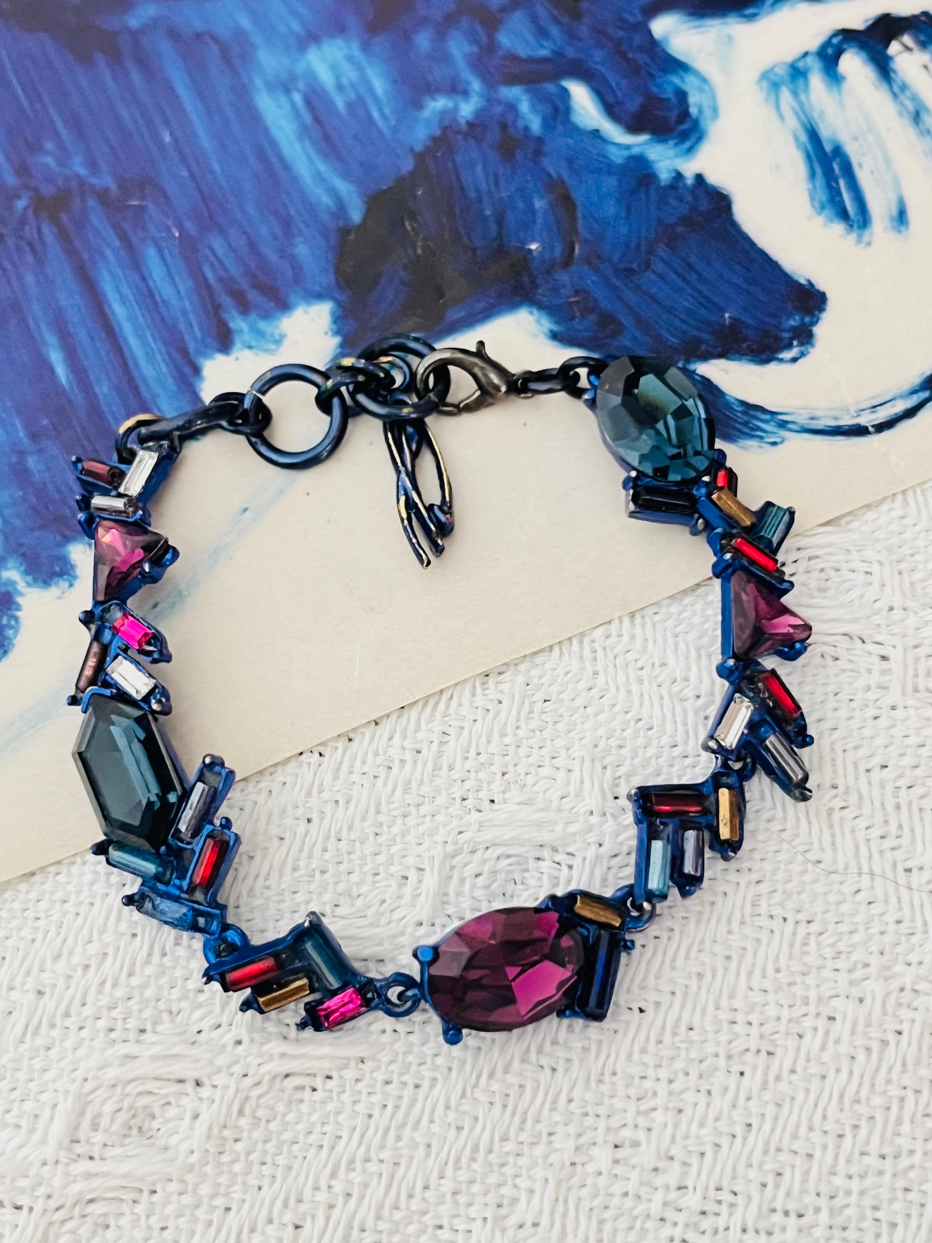 Christian Lacroix Vintage Hexagon Oval Triangle Navy Blue Purple Fuchsia Red Iridescent Bar Crystals Modernist Chain Bracelet

Very good condition. Maybe some small crystals have been changed. Light colour loss. Very good to wear. 100%