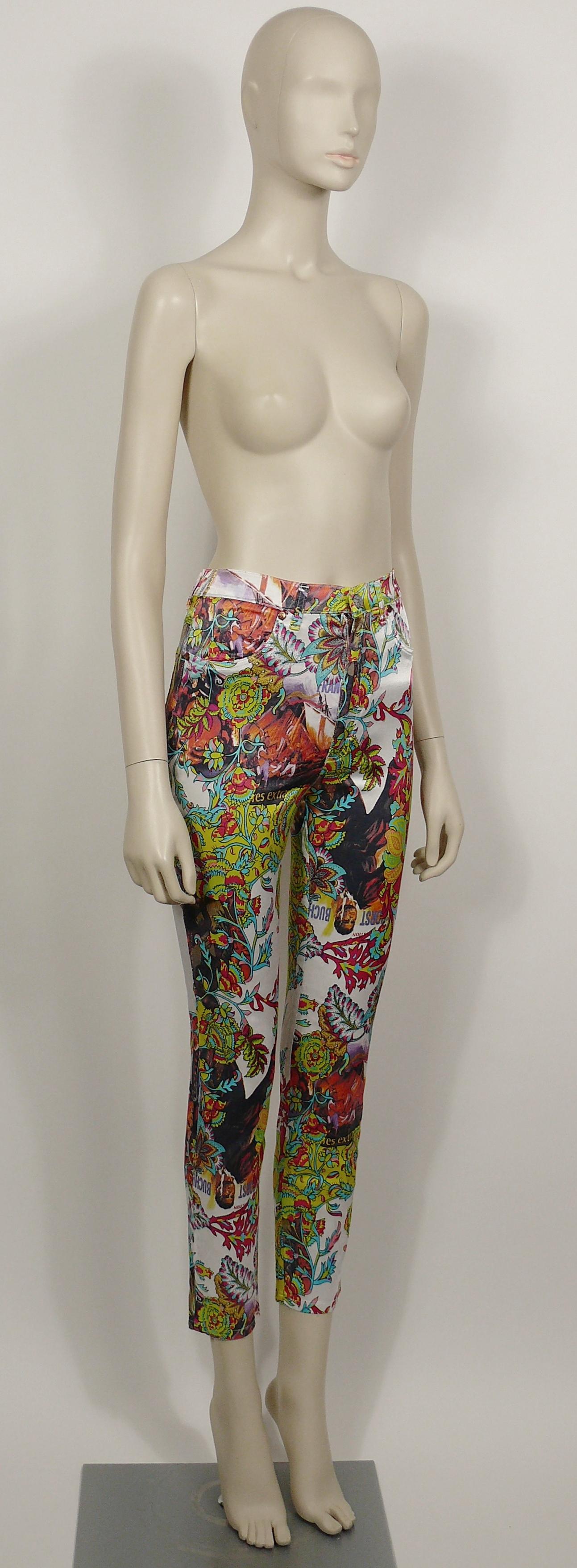CHRISTIAN LACROIX vintage colourful floral print pants trousers featuring actor HORST BUCHOLZ posters.

Waist button and zippered closure.
Two faux front pockets.
Two back pockets.
Belt loops.
CL signature copper toned rivets.
Has stretch.

Label