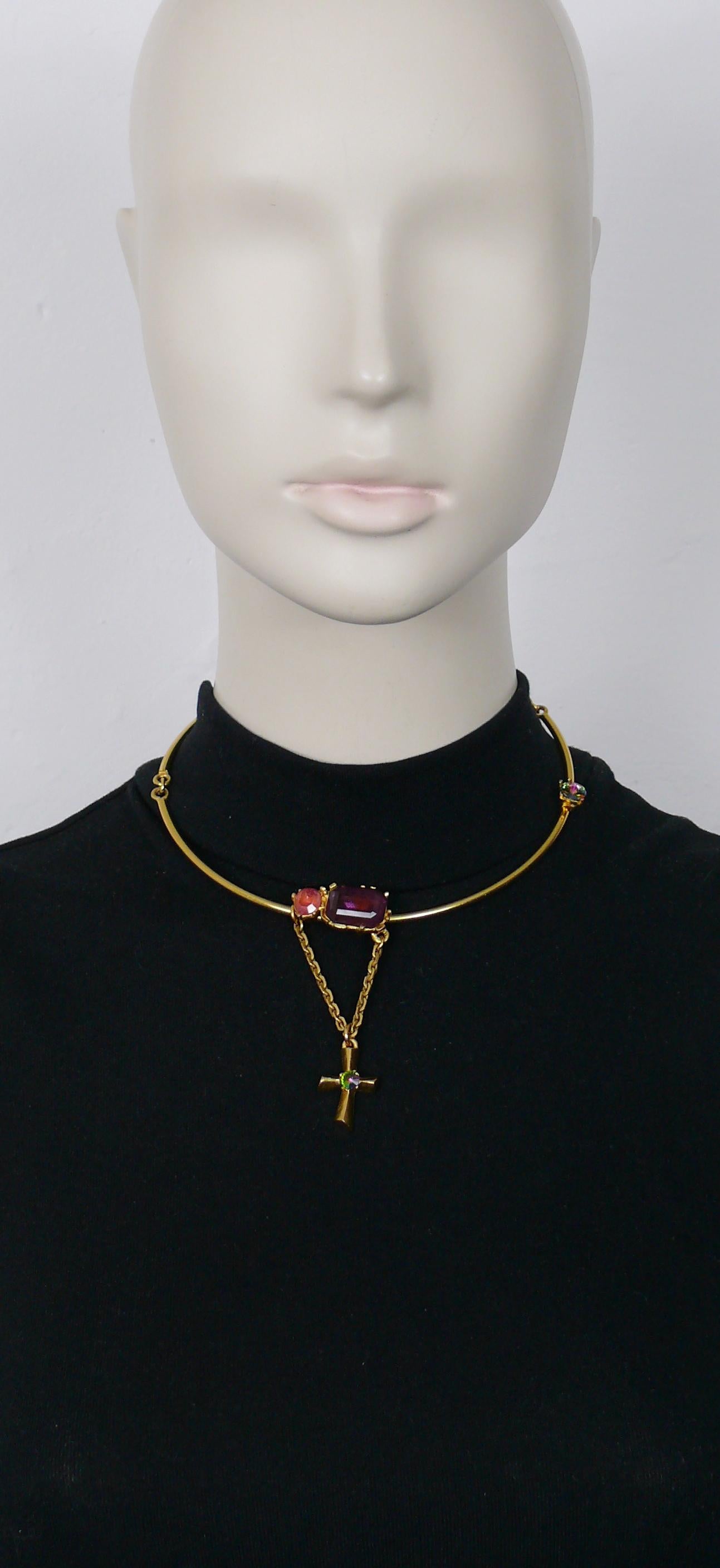 CHRISTIAN LACROIX vintage gold toned necklace embellished with pink, purple and iridescent crystals and featuring a little cross pendant.

CL signature charm at the end of the extension chain.
Embossed CHRISTIAN LACROIX CL Made in France on the