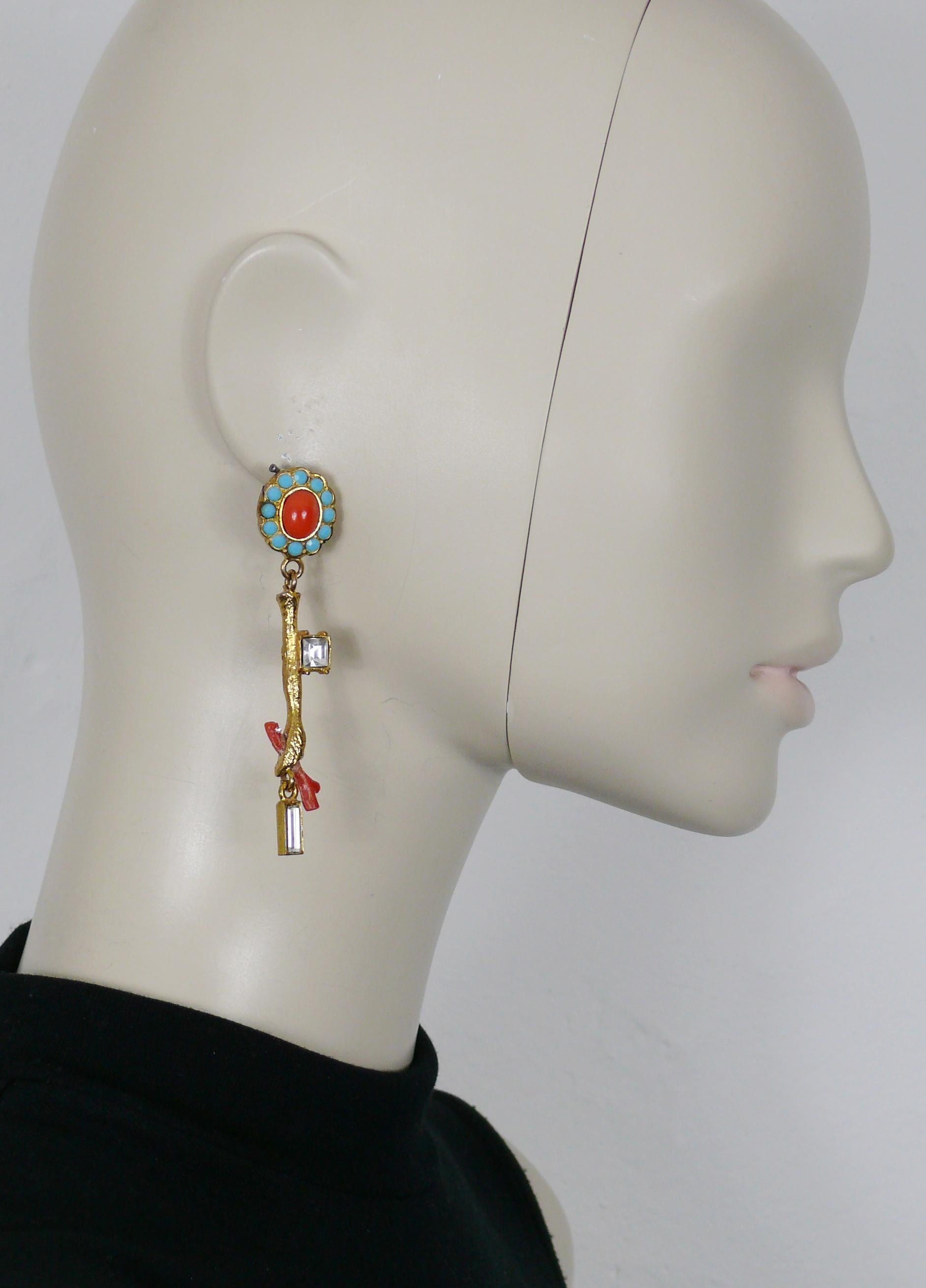 CHRISTIAN LACROIX vintage gold tone dangling earrings (clip-on) embellished with multicolored crystals, glass cabochon and resin faux coral branch.

Marked CHRISTIAN LACROIX CL Made in France.

Indicative measurements : max. height approx. 8 cm