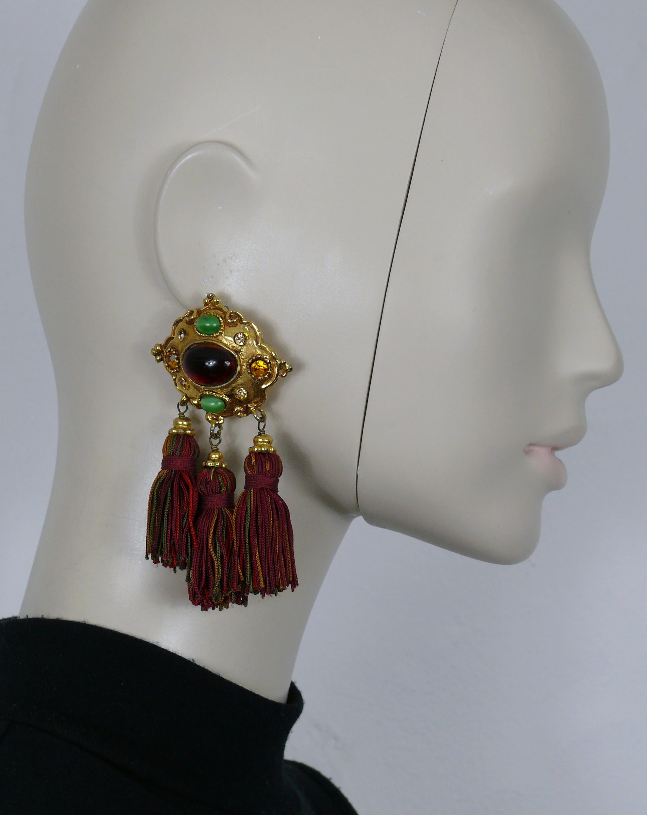 CHRISTIAN LACROIX vintage gold tone dangling earrings (clip-on) embellished with glass cabochons, crystals and three multicolor tassel drops.

Marked CHRISTIAN LACROIX CL Made in France.

Indicative measurements : max. height approx. 9.5 cm (3.74