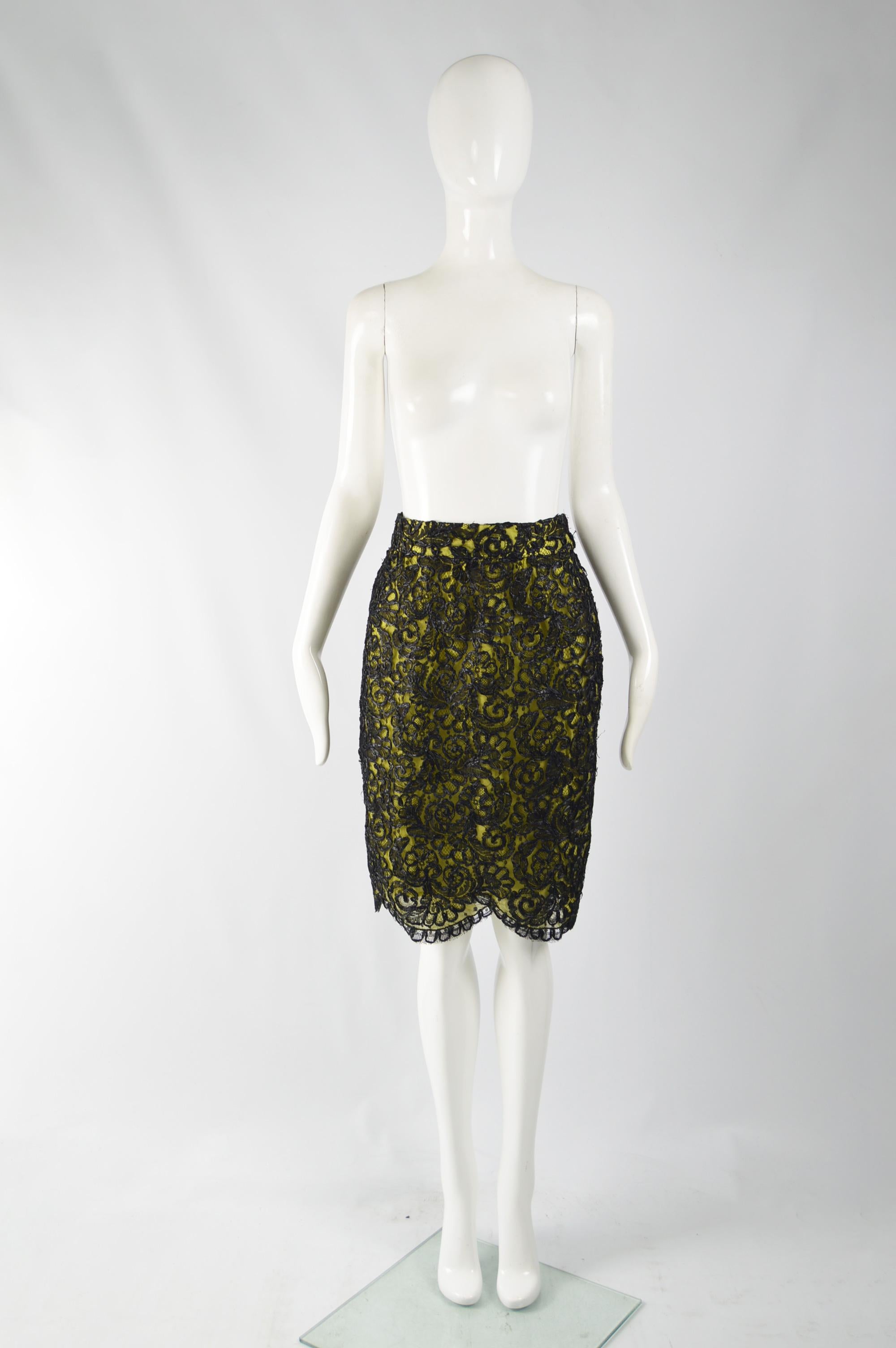 A chic vintage womens skirt from the 90s by luxury French fashion designer, Christian Lacroix. In a lime green fabric with a lace overlay and black raffia creating an intricate pattern, perfect for the evening or at a party. 

Size: Marked vintage I