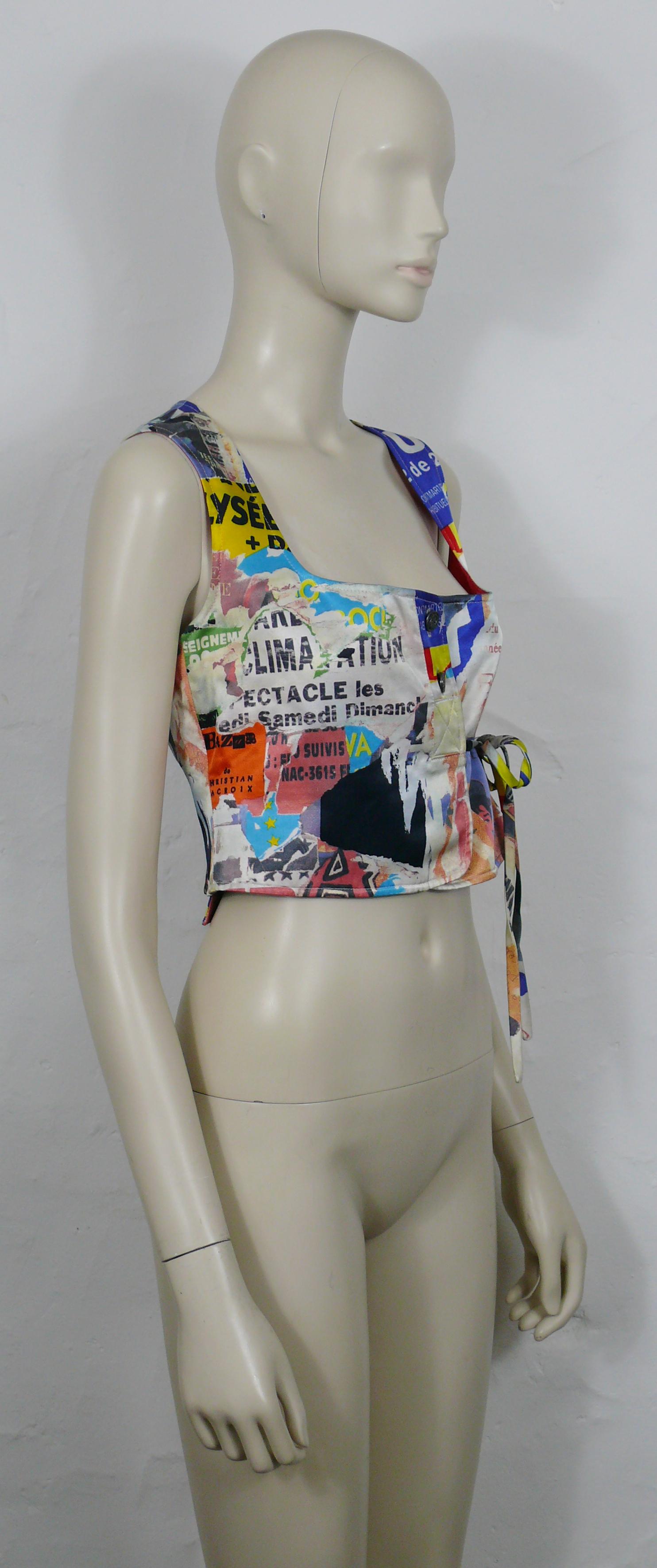CHRISTIAN LACROIX vintage colourful Pop Art vest featuring a stunning lacerated retro poster print all over in vibrant colors.

Front buttoning (2 buttons).
Side strap fastening.

Label reads BAZAR de CHRISTIAN LACROIX.

Size label reads :