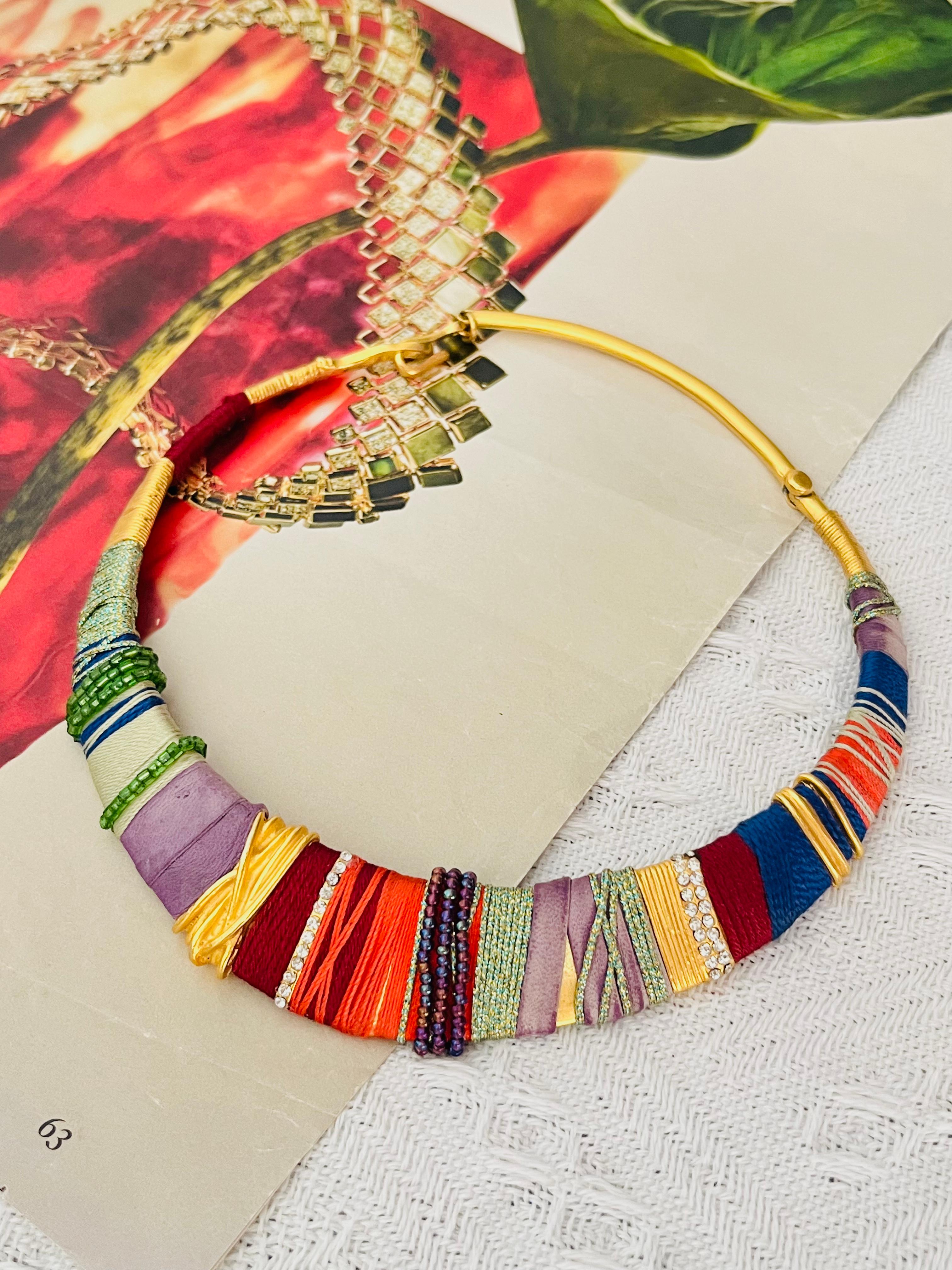 Christian Lacroix Vintage 1994 Masai Crystals Beads Threads Leather Red Navy Blue Green Purple Orange Modernist Abstract Choker Collar Necklace, Gold Plated

Very good condition. Light scratches or colour loss, barely noticeable. 100% Genuine.