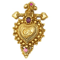 Broche imposante Christian Lacroix Vintage Noël 1989 avec logo en forme de cœur et croix en améthyste