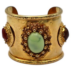 CHRISTIAN LACROIX - Bracelet manchette vintage baroque orné de cabochons en métal doré