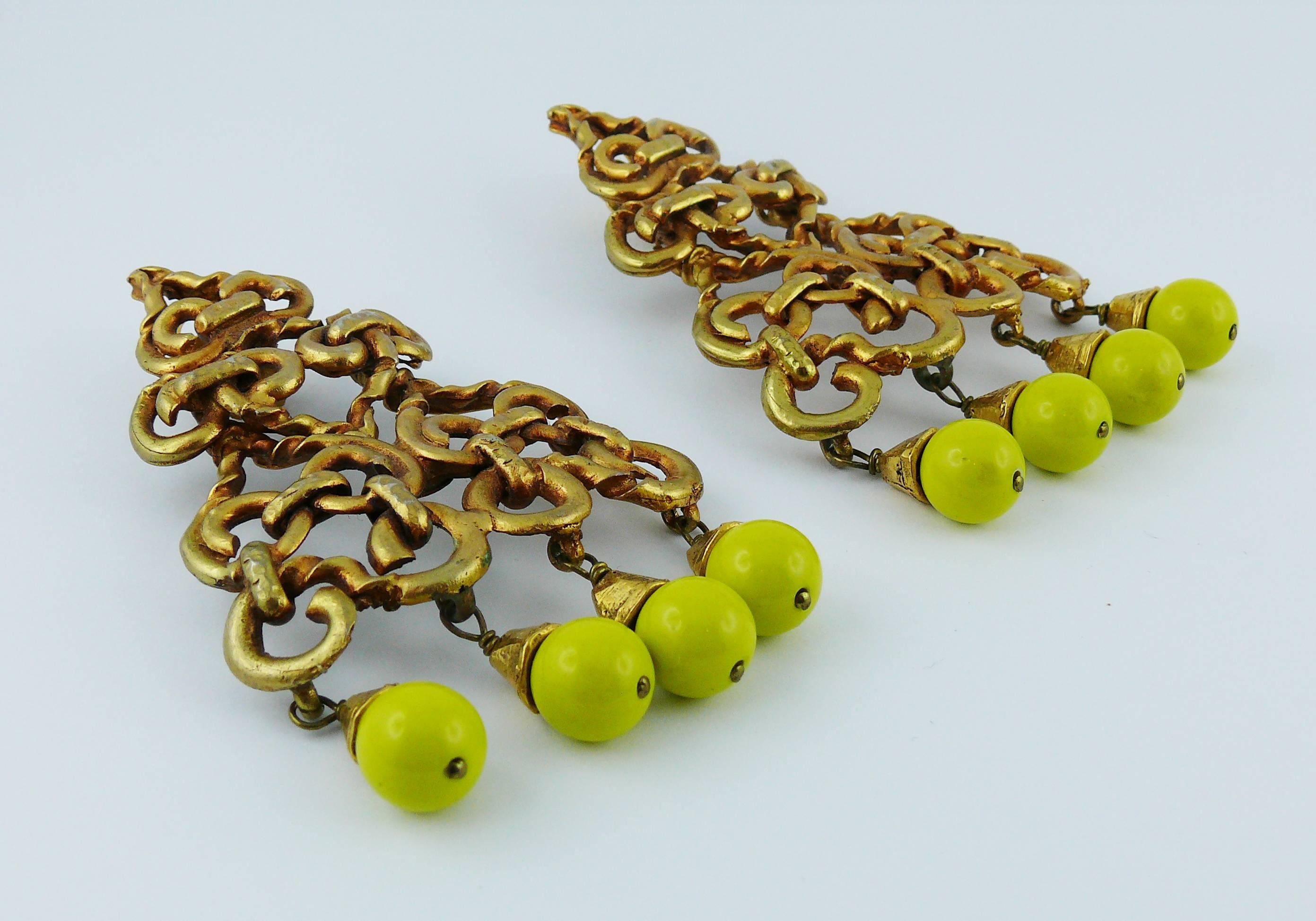 CHRISTIAN LACROIX vintage oversized antiqued matte gold tone dangling earrings (clip-on) featuring intricated hearts and yellow bead drops.

Marked CHRISTIAN LACROIX CL Made in France.

Indicative measurements : max. height approx. 9.3 cm (3.66