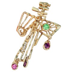 Christian Lacroix – Seltene Vintage-Brosche im Kreuzdesign mit Smaragd und Amethyst, asymmetrisch und klobig