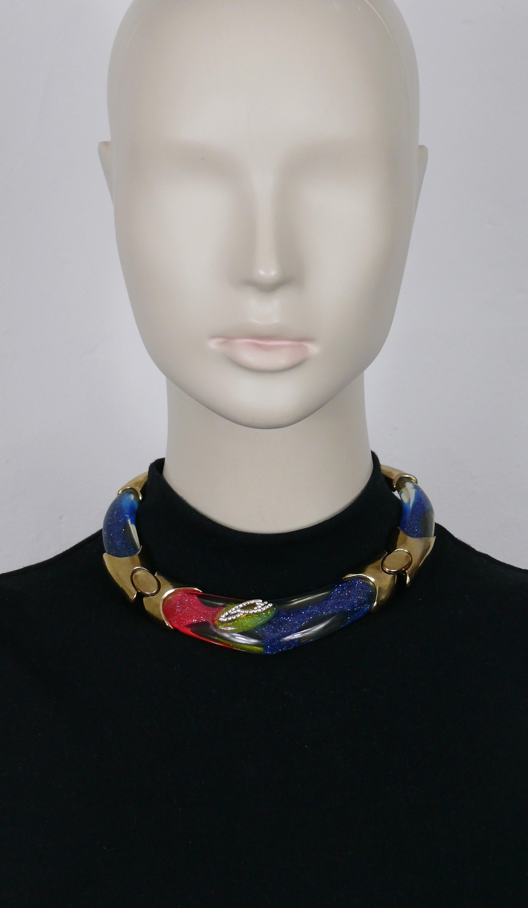 CHRISTIAN LACROIX vintage articulated gold tone and resin choker necklace featuring a CL monogram embellished with clear crystals.

Lobster clasp closure.

Marked CHRISTIAN LACROIX CL Made in France.

Indicative measurements : inner measurements