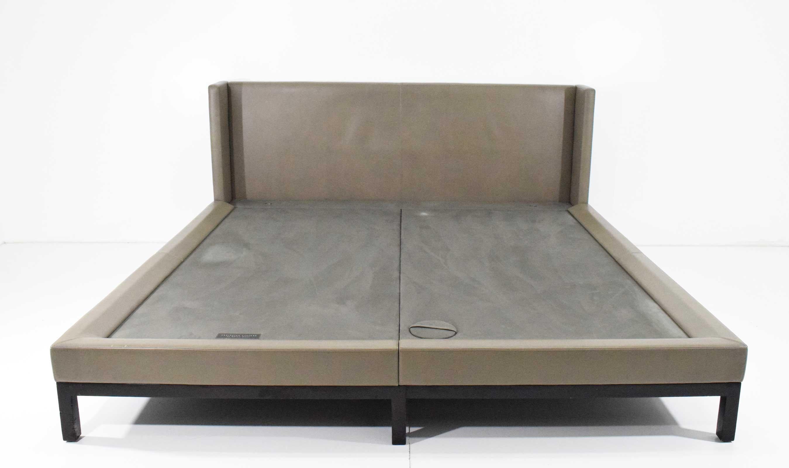 Beautiful king bed by Christian Liaigre for Holly Hunt. Extremely well constructed, leather in very good condition, structurally sound. Espresso wood frame.