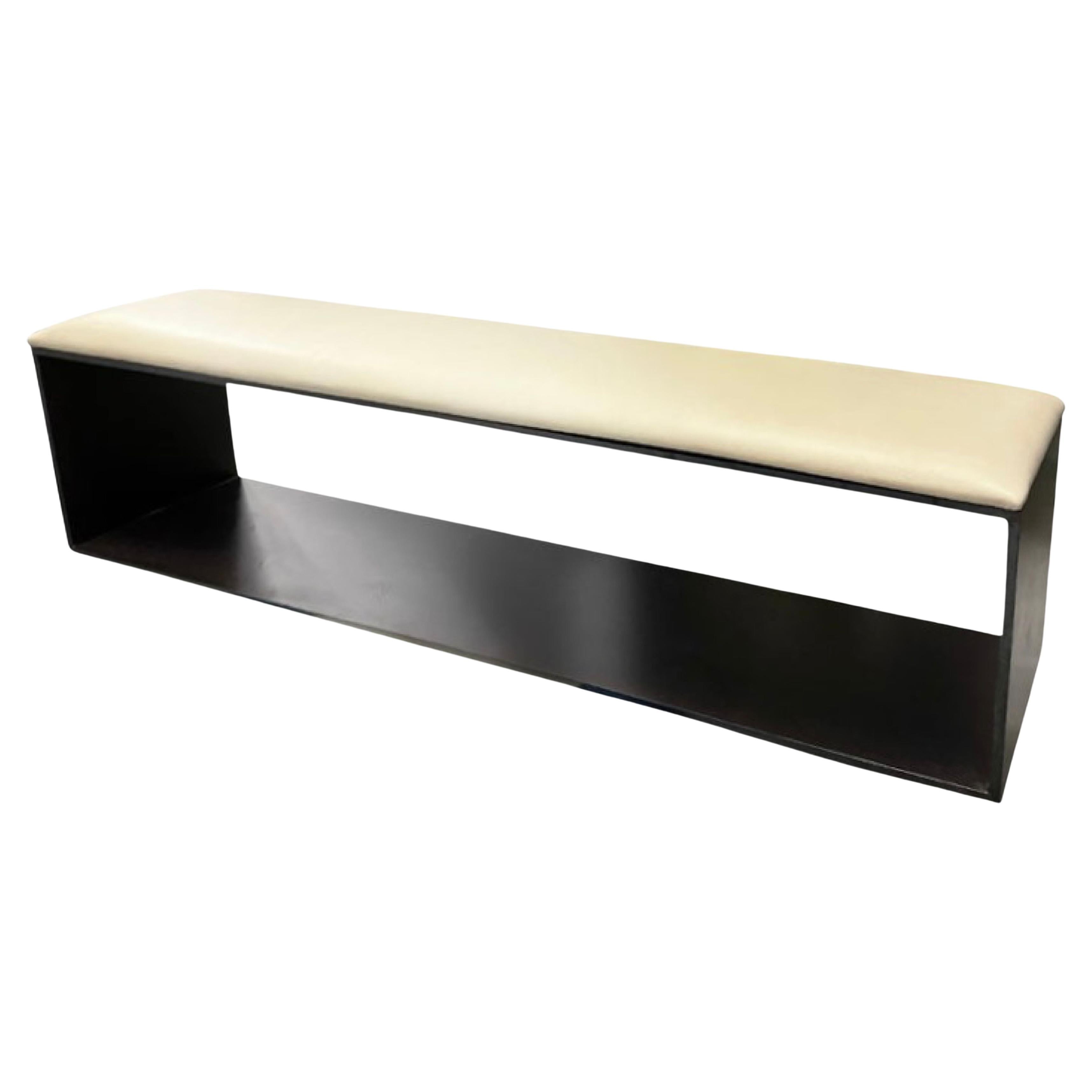 Christian Liaigre for Holly Hunt Leather and Bronze bench, Minimal Modern France. Cream leather top. Solid metal base. Sleek and minimal with substantial weight. No longer in production.