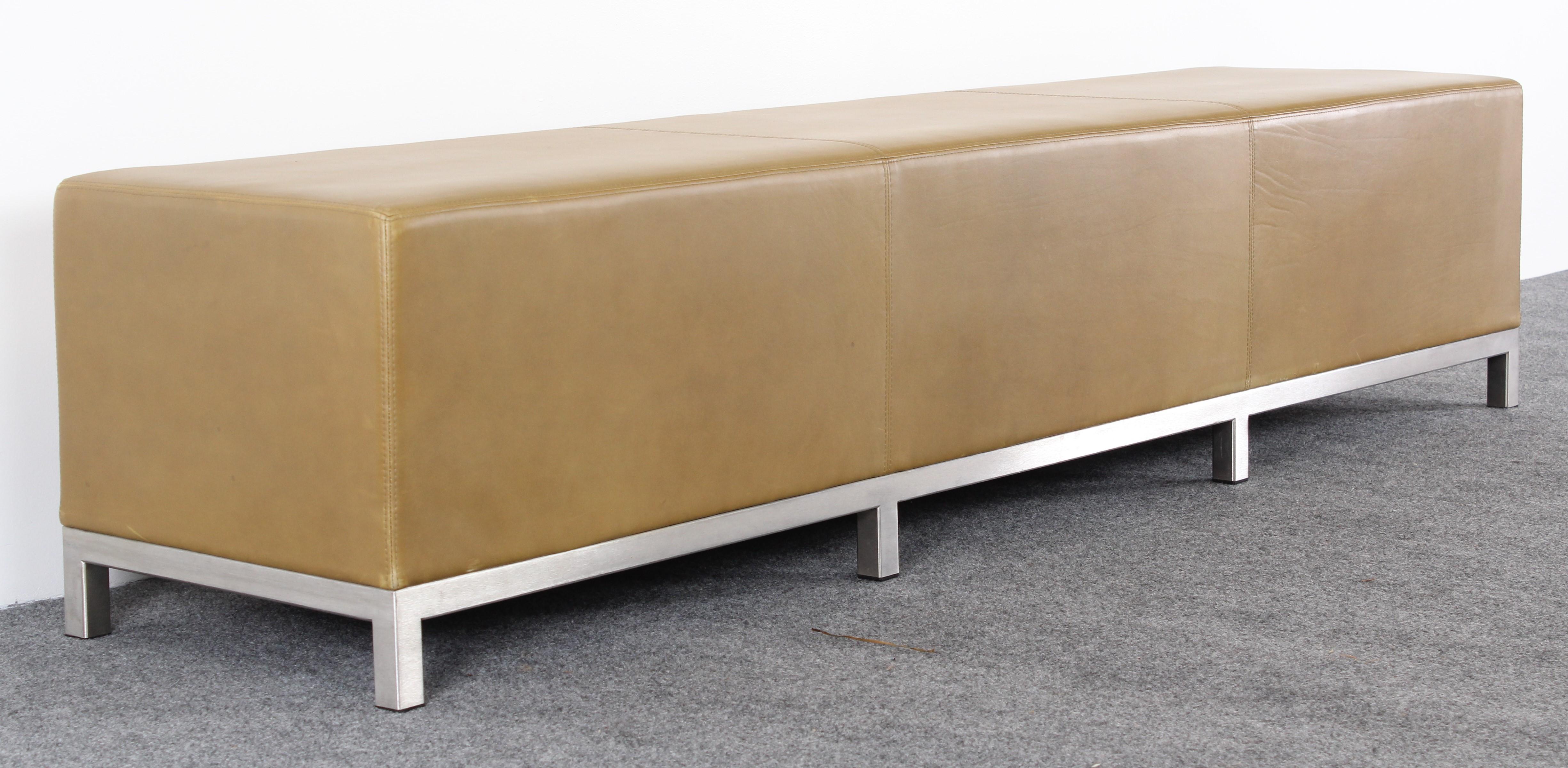 A luxurious and very sturdy Christian Liaigre Grume bench with supple chartreuse leather on a brushed stainless steel frame. Made at Holly Hunt in the 2000s. This model is no longer in production. Bench has light scuffs, slightly distressed wear,