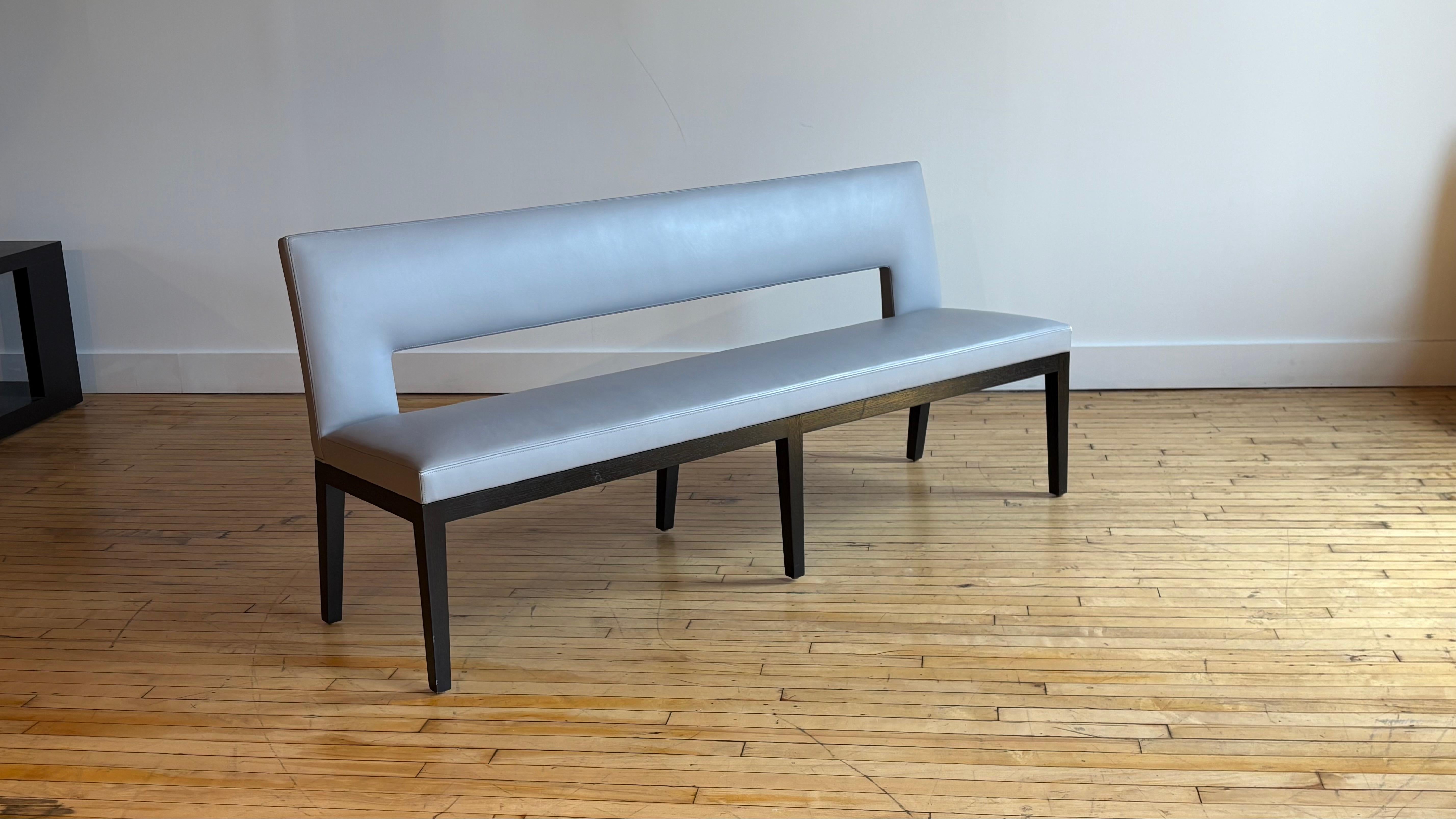 We are pleased to present a Christian Liaigre blue/grey leather banquette, purchased from the NYC liaigre showroom around 2012. 

We also have four Velin dining chairs in matching leather to go with this bench. Sold separately. We also have a