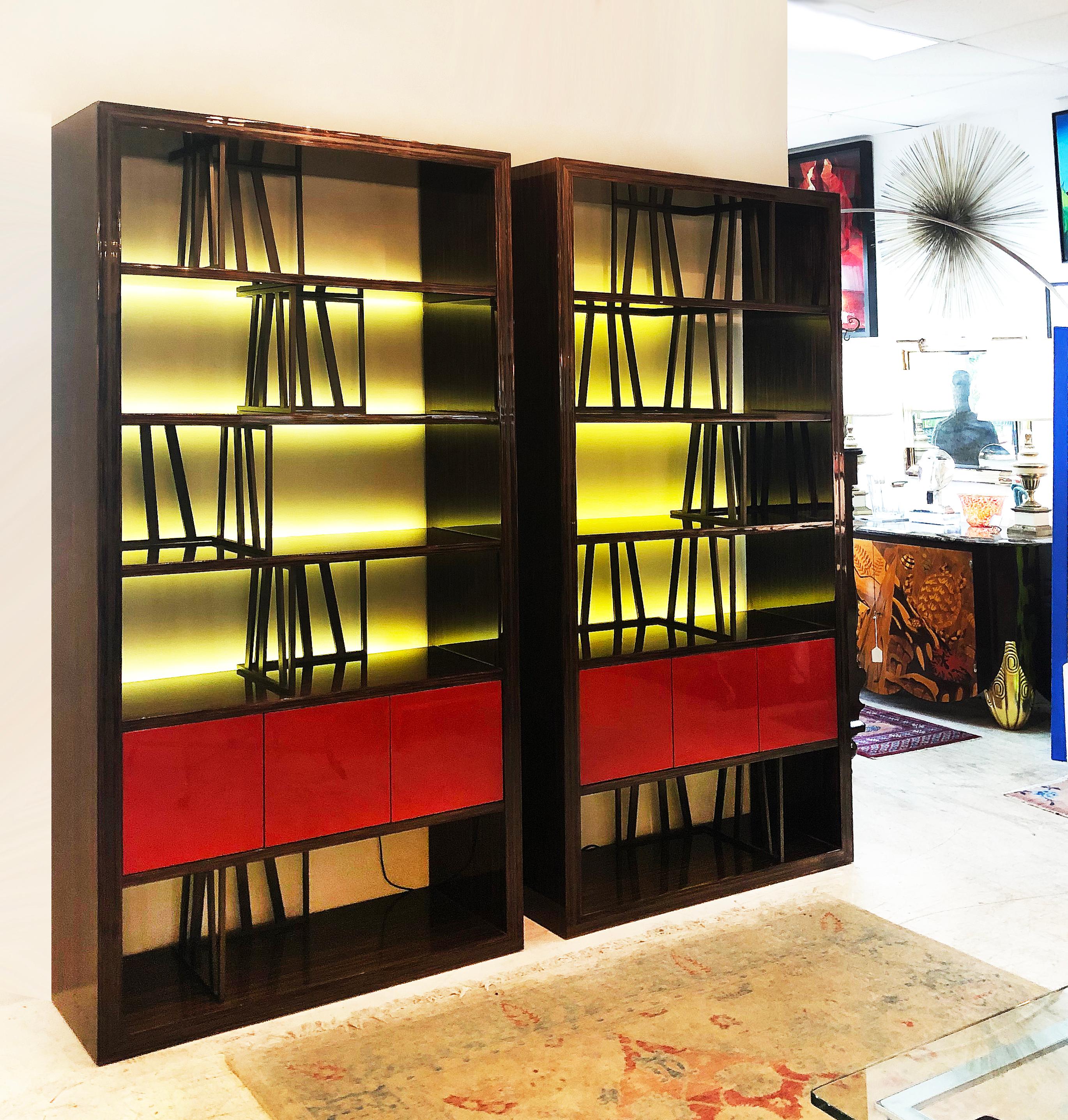 Christian Liaigre Macassar ebony bookcases/room divider, pair

Offered for sale is a pair of Christian Liaige Macassar, ebony, and lacquered wood bookcases or room dividers. The bookcases are open in the back and finished on all sides so they can