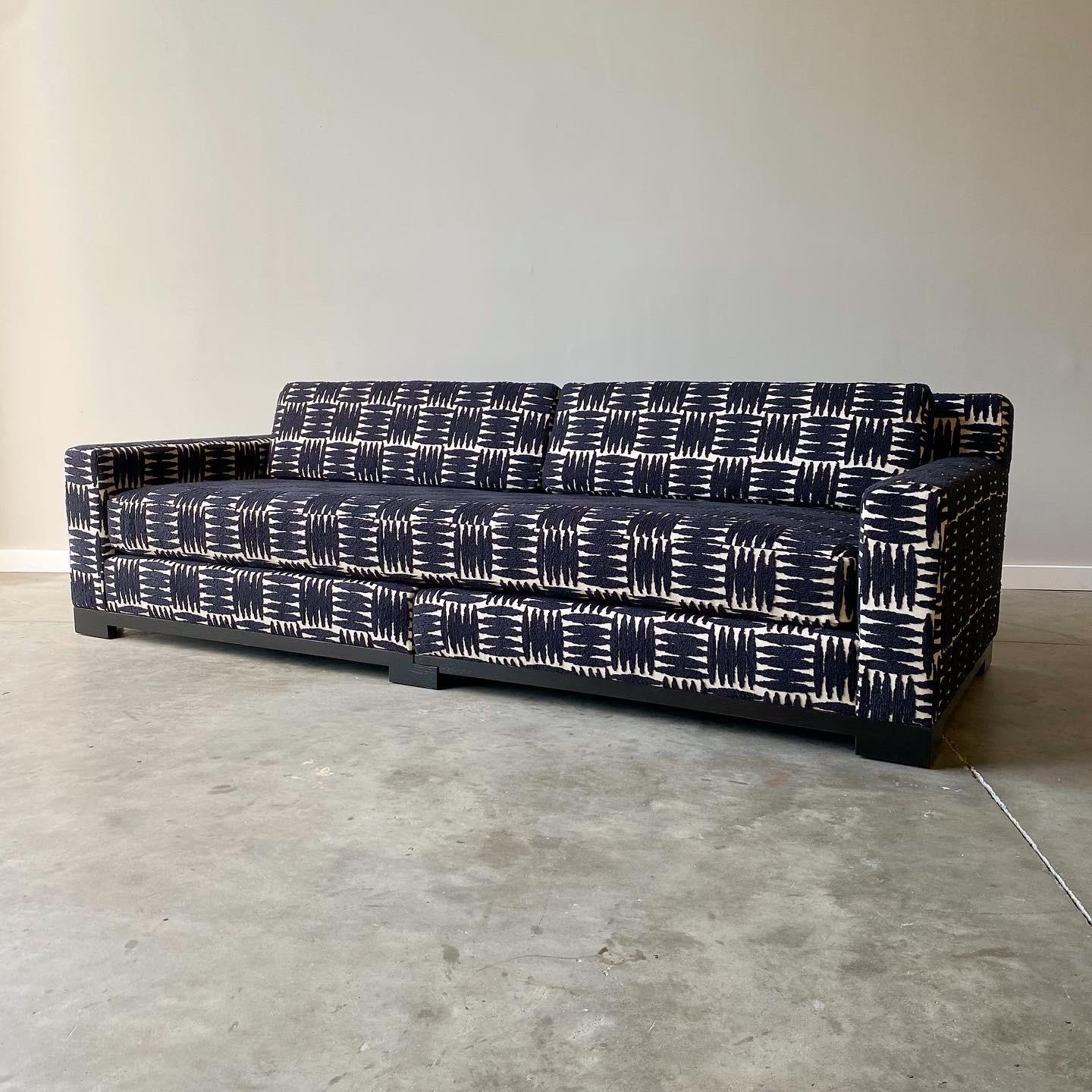 A simple and stunning design by Christian Liaigre produced by Holly Hunt.  This two piece sofa is very deep and comfortable and is newly upholstered in a striking textured abstract cotton fabric.

measures 101” long, 42” deep, 30” high

19” seat