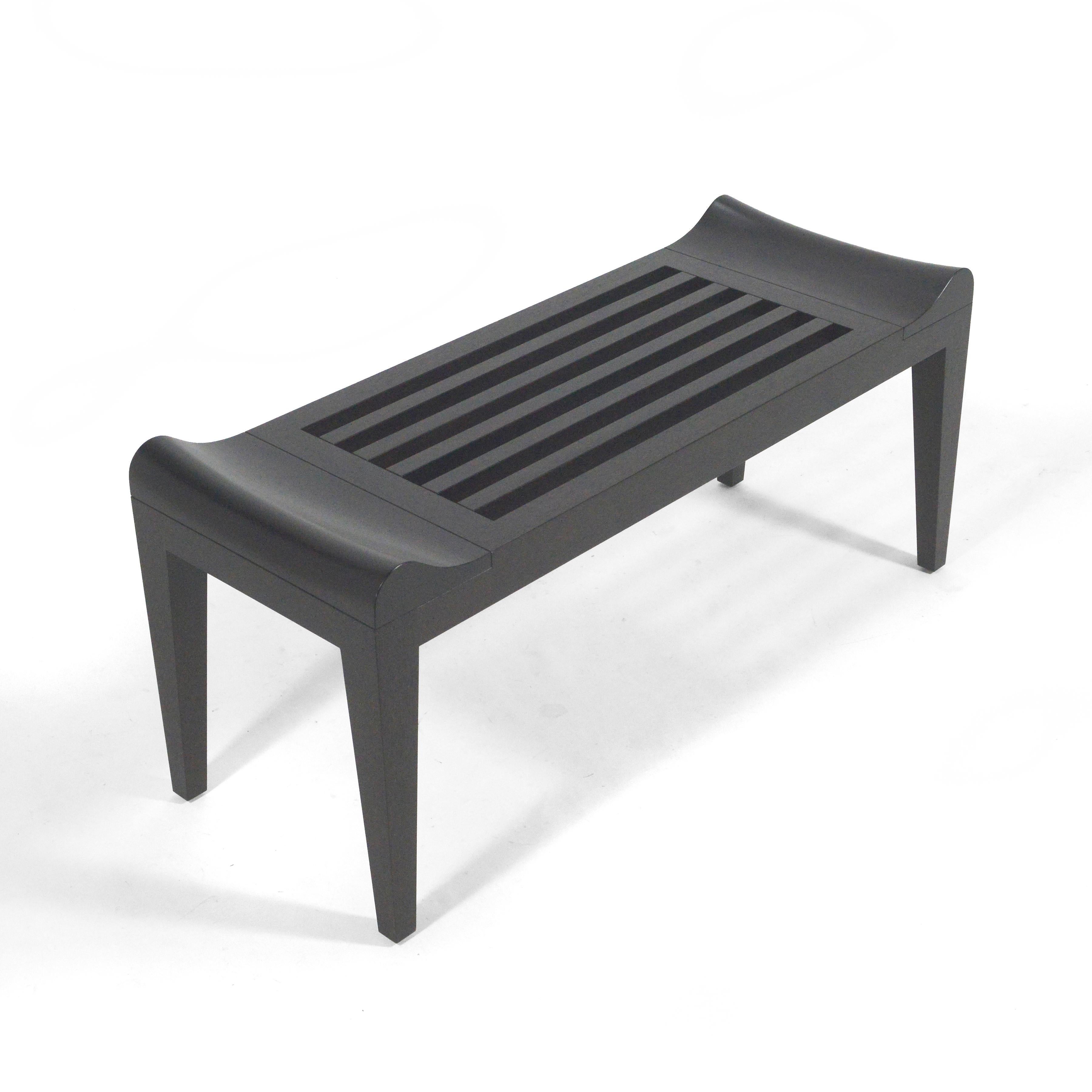This beautiful slat bench by Christian Liaigre for Holly Hunt is crafted of African rosewood and is perfectly scaled to be used in an entryway, at the foot of the bed, or anywhere an elegant, undestated bench would be appropriate.


Measures: 20