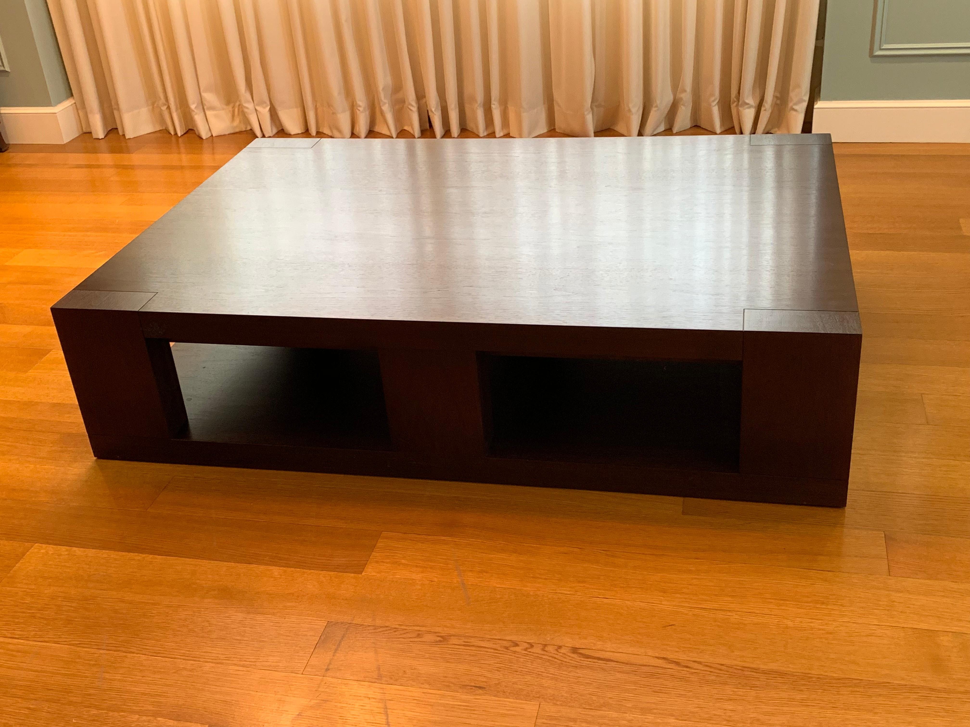 Christian Liaigre walnut cocktail table from Holly Hunt
Standard Toja cocktail table 
Walnut finish 
Tiny scratch on side.