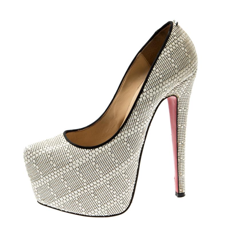Take your love for Louboutins to new heights by adding this gorgeous pair to your collection. The pumps simply speak high fashion in every stitch and curve. The exteriors come made from white raffia and the pumps are finished with platforms, 16.5 CM