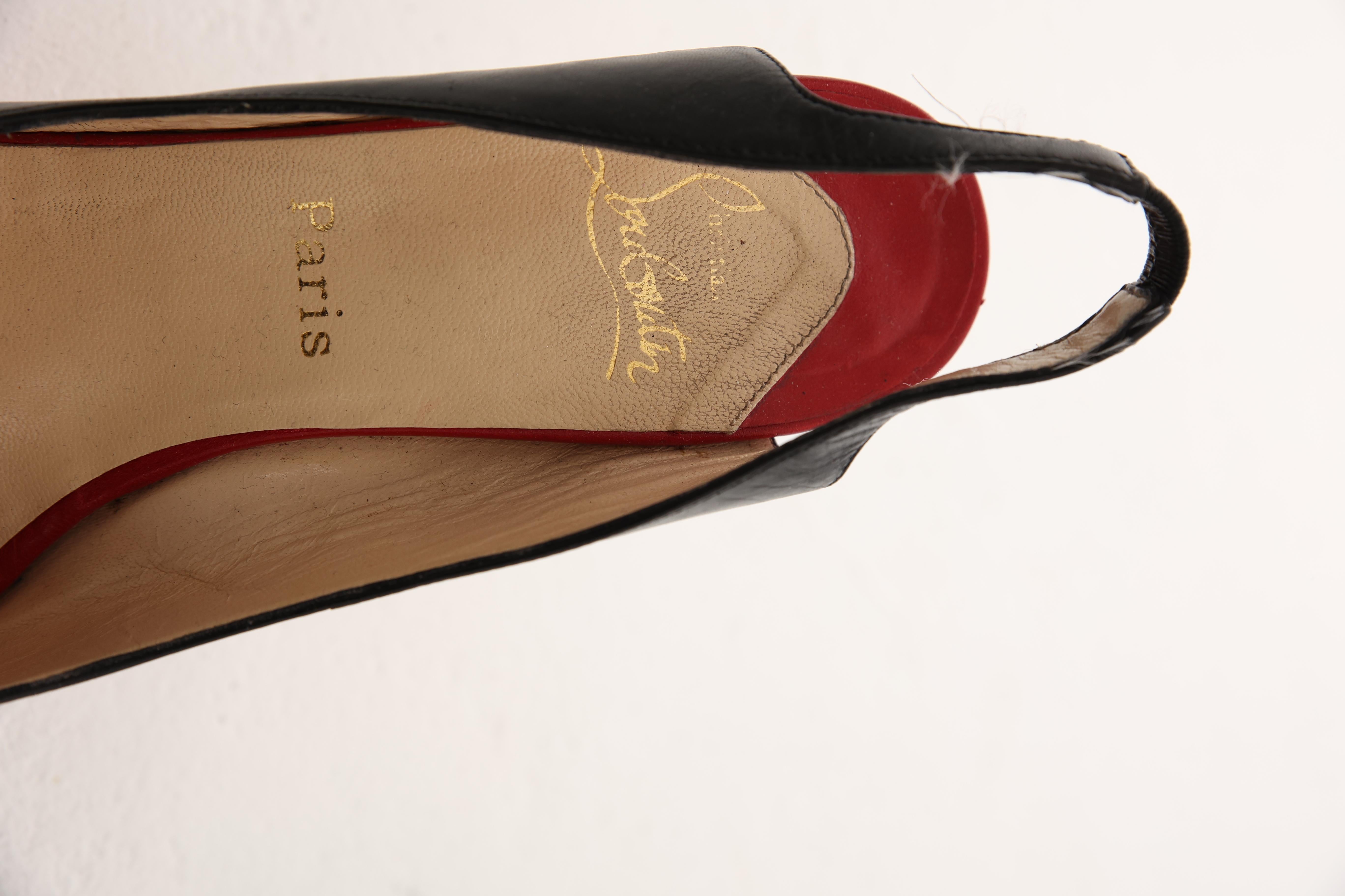 Christian Louboutin  bombas de cuero rojo y negro de los años 2000 en Excelente estado para la venta en Caserta, IT
