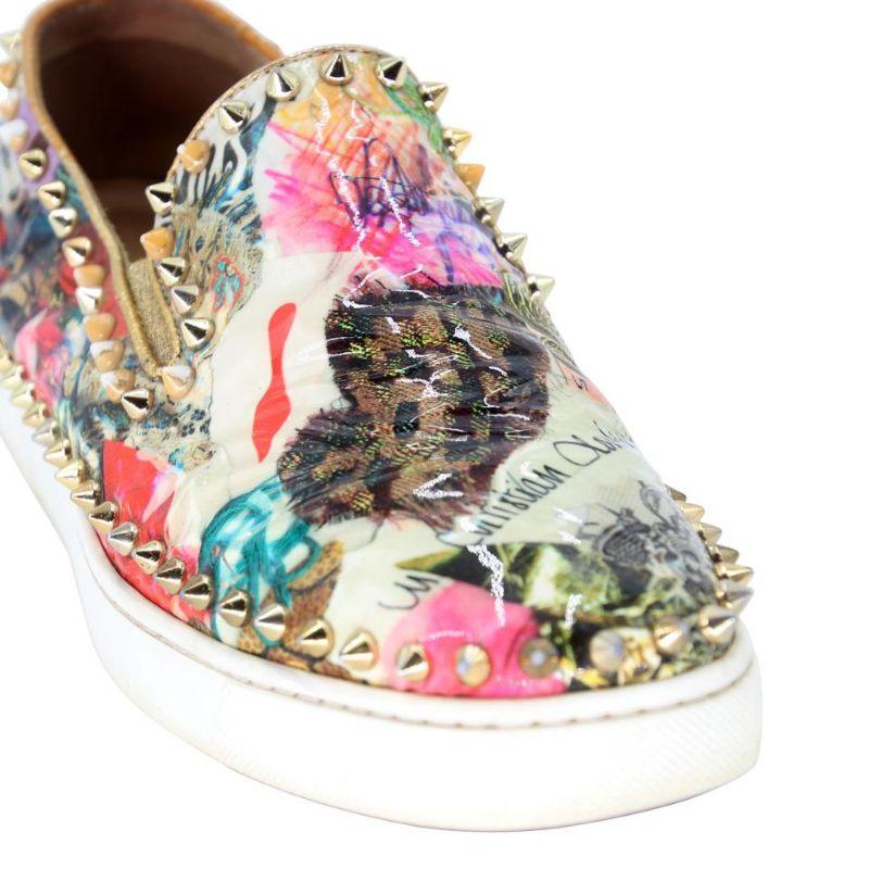 Christian Louboutin 39.5 Slip on Studded Boat Sneakers CL-1021P-0006

These Christian Louboutin studded sneakers are a must have for the edgy fashionista! These Boat slip-on sneakers have gold-tone studs and a chic multicolor print. The soles are