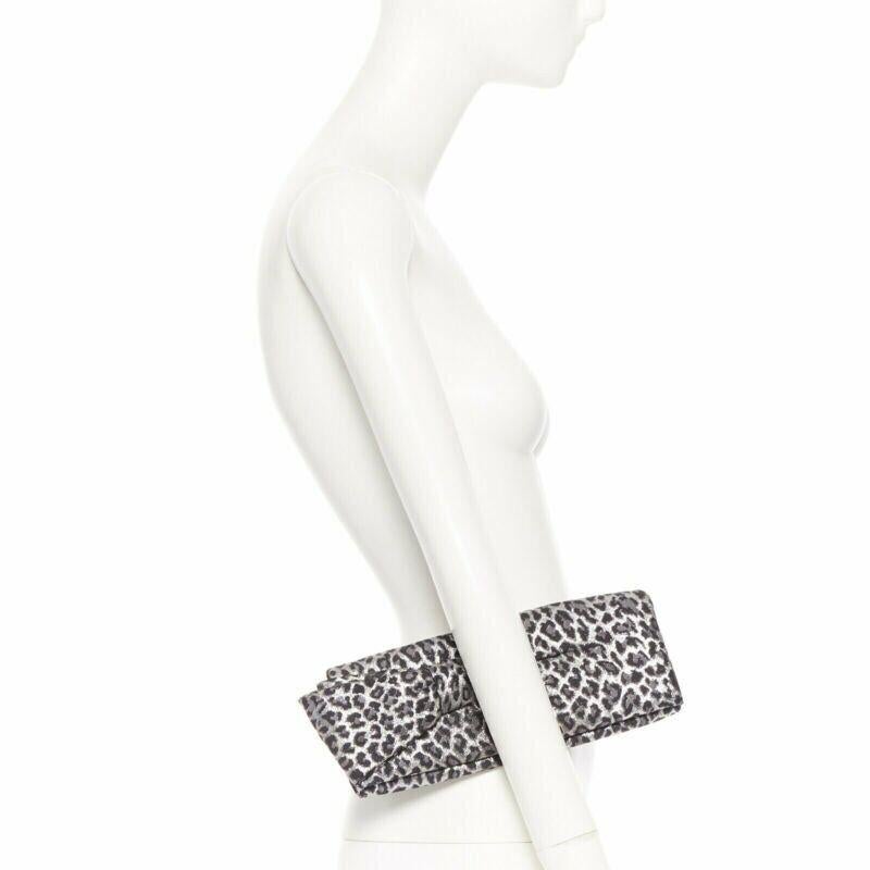 Silver CHRISTIAN LOUBOUTIN Aionoeud silver leopard asymmetrical bow elongated clutch