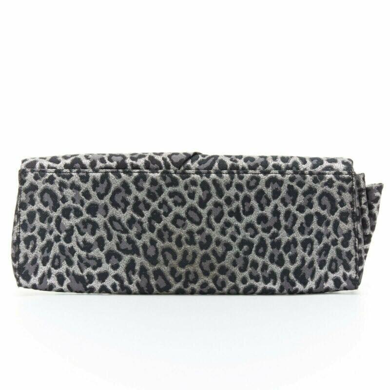CHRISTIAN LOUBOUTIN Aionoeud silver leopard asymmetrical bow elongated clutch In Good Condition For Sale In Hong Kong, NT