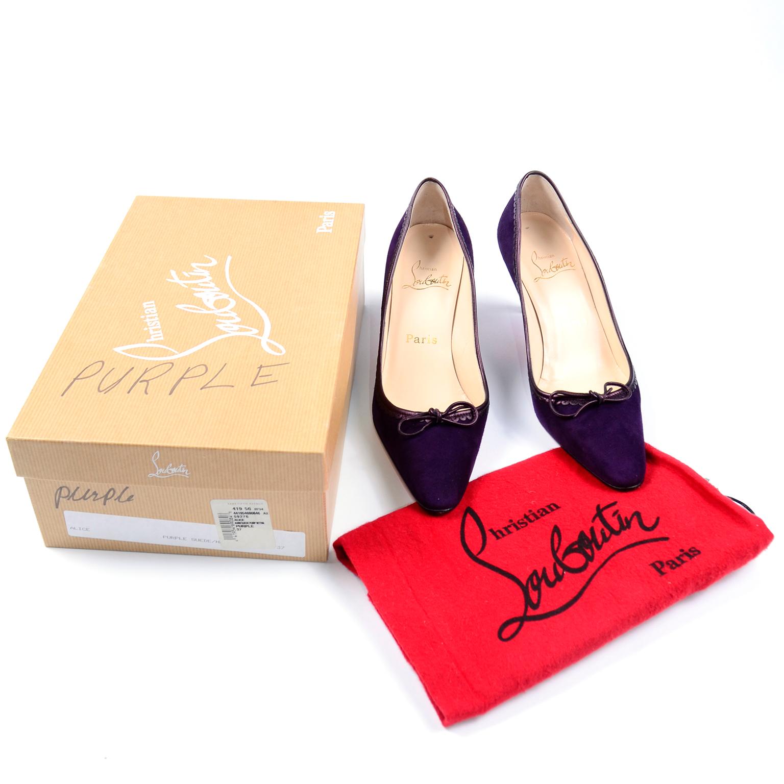These Christian Louboutin deep purple suede pointed toe pumps have metallic leather trim and a bow on the toe box. These shoes are a fun take on a classic pump silhouette. The purple suede is very rich against the signature Louboutin red bottom
