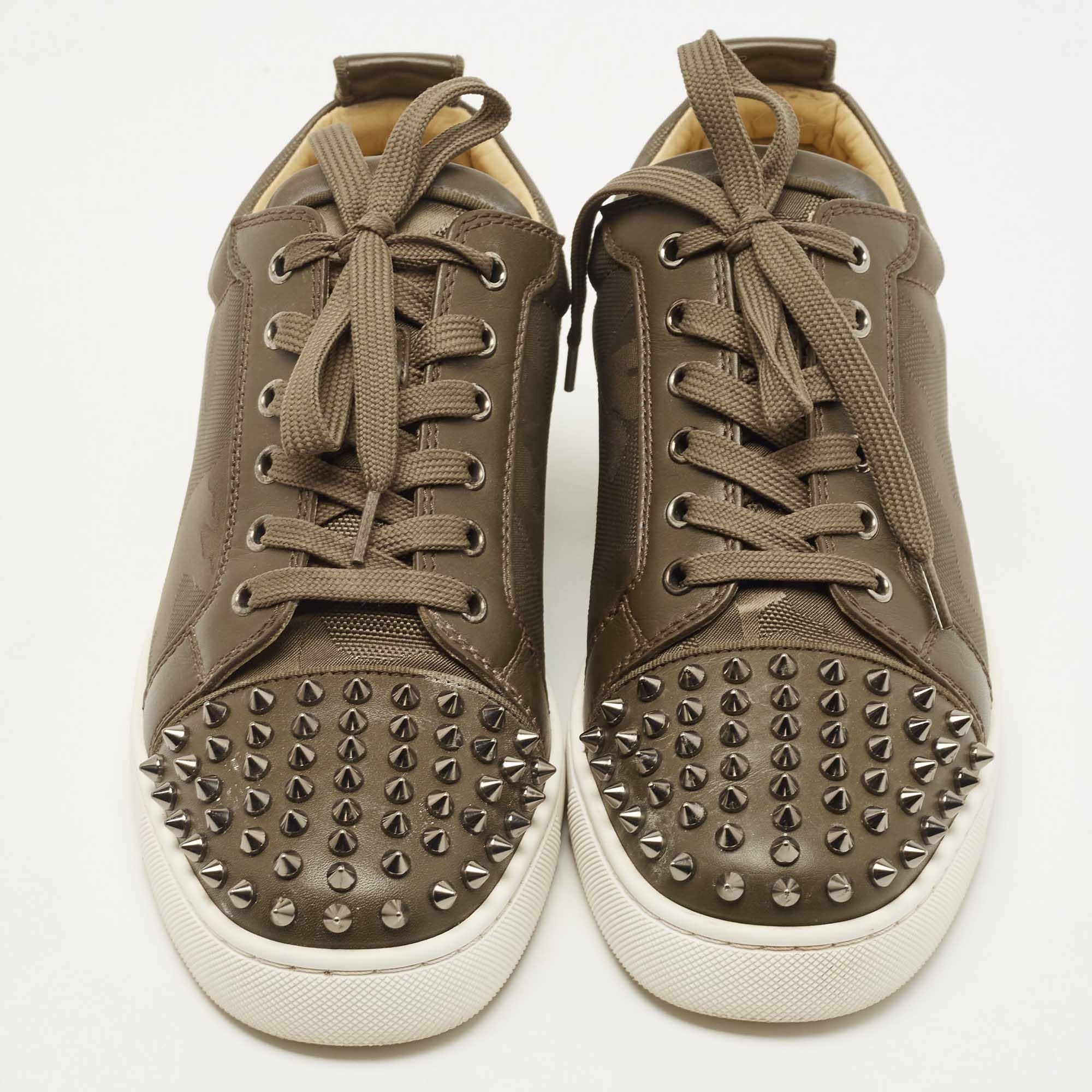 Add a statement appeal to your outfit with these Christian Louboutin sneakers. Made from premium materials, they feature lace-up vamps, stud details, and relaxing footbeds. The rubber sole of this pair aims to provide you with everyday ease.


