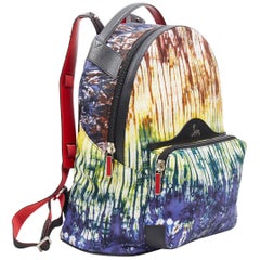 CHRISTIAN LOUBOUTIN Sac à dos en cuir clouté en toile imprimé tie die Backloubi