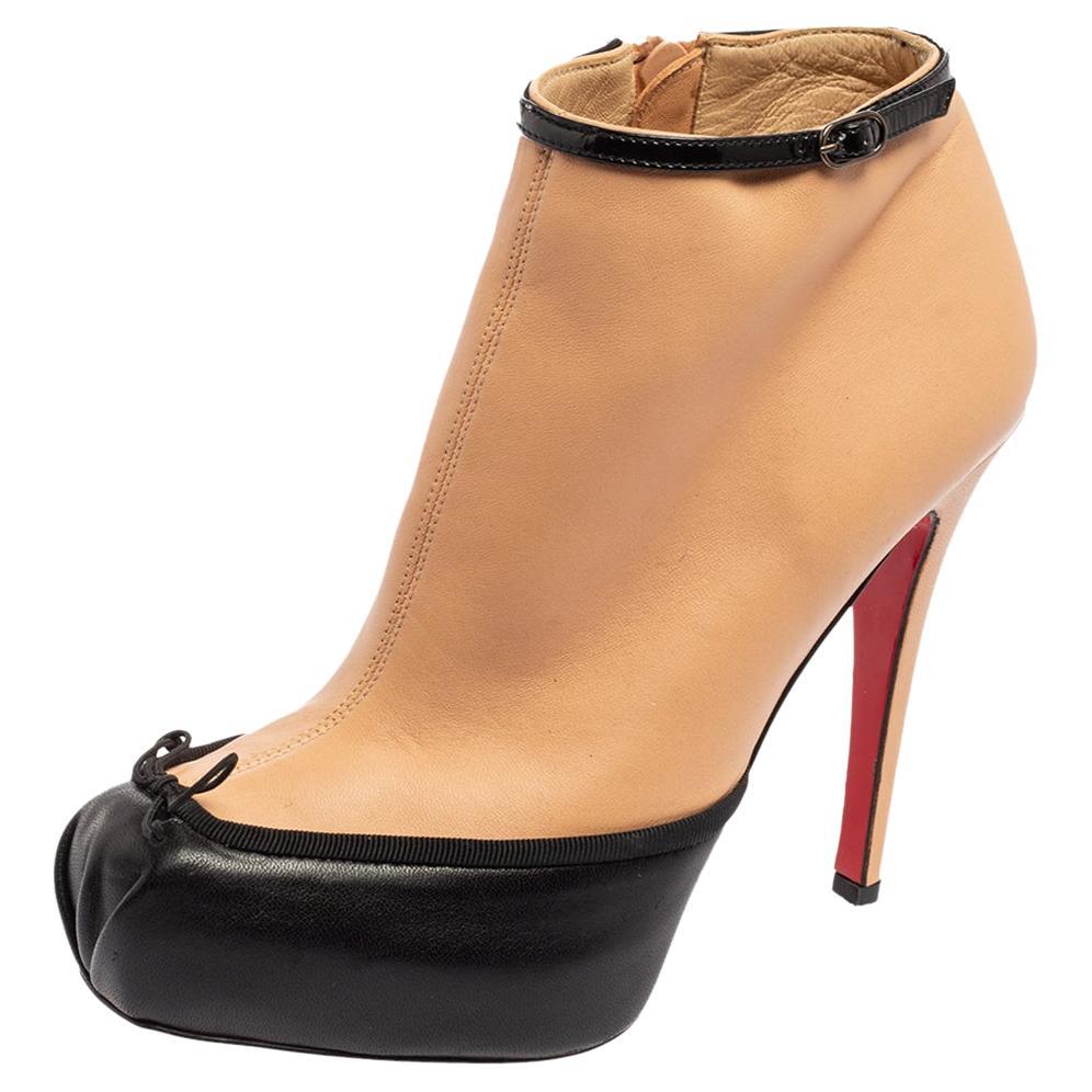Christian Louboutin Beige/Black Leather Bow Ankle Boots Size 36.5 For Sale