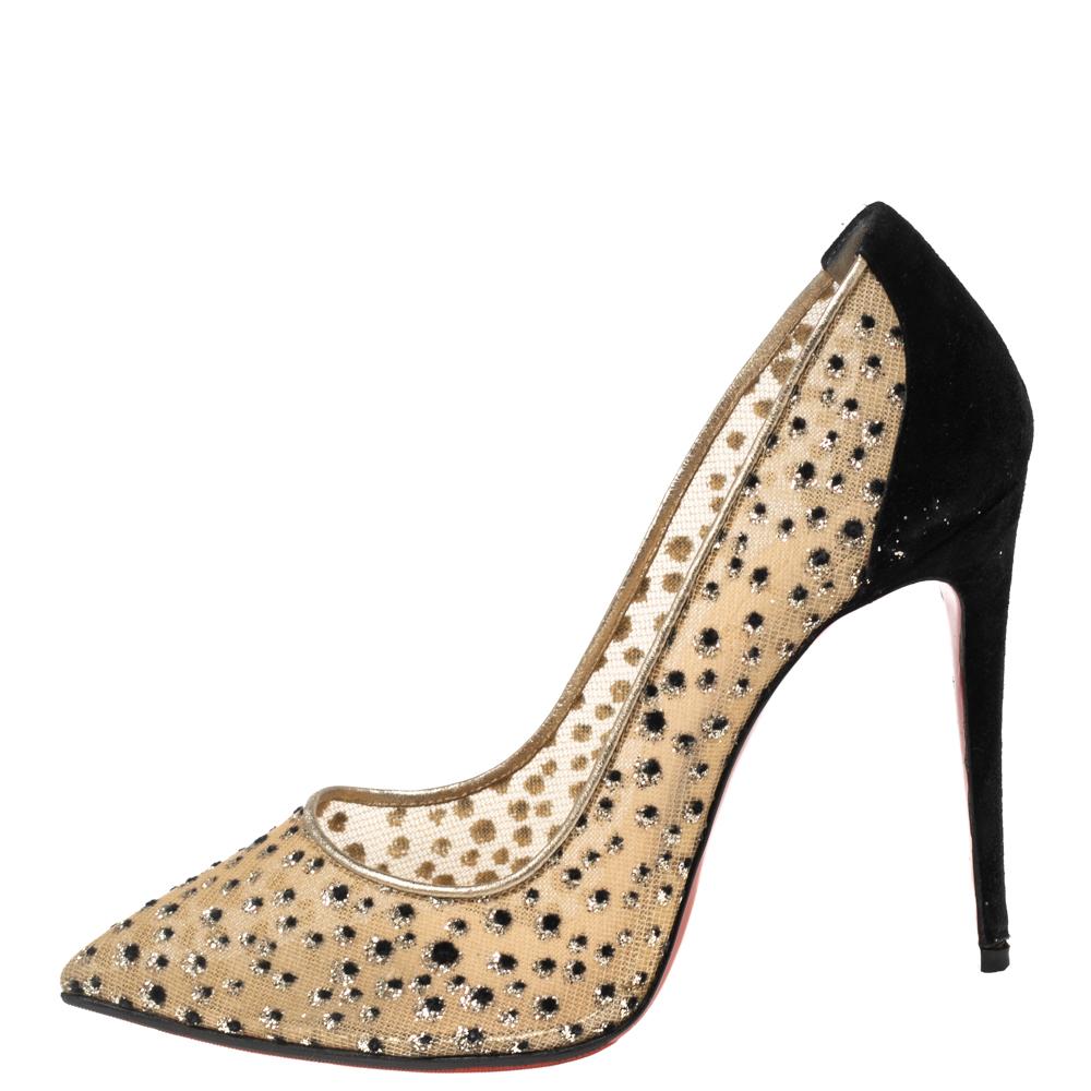 Go high-fashion with these Christian Louboutin pumps that are exquisitely made from mesh and suede. The beige and black pumps feature a beautiful dotted design, leather insoles, and high heels. Truly a stunning, magical pair that will make for a