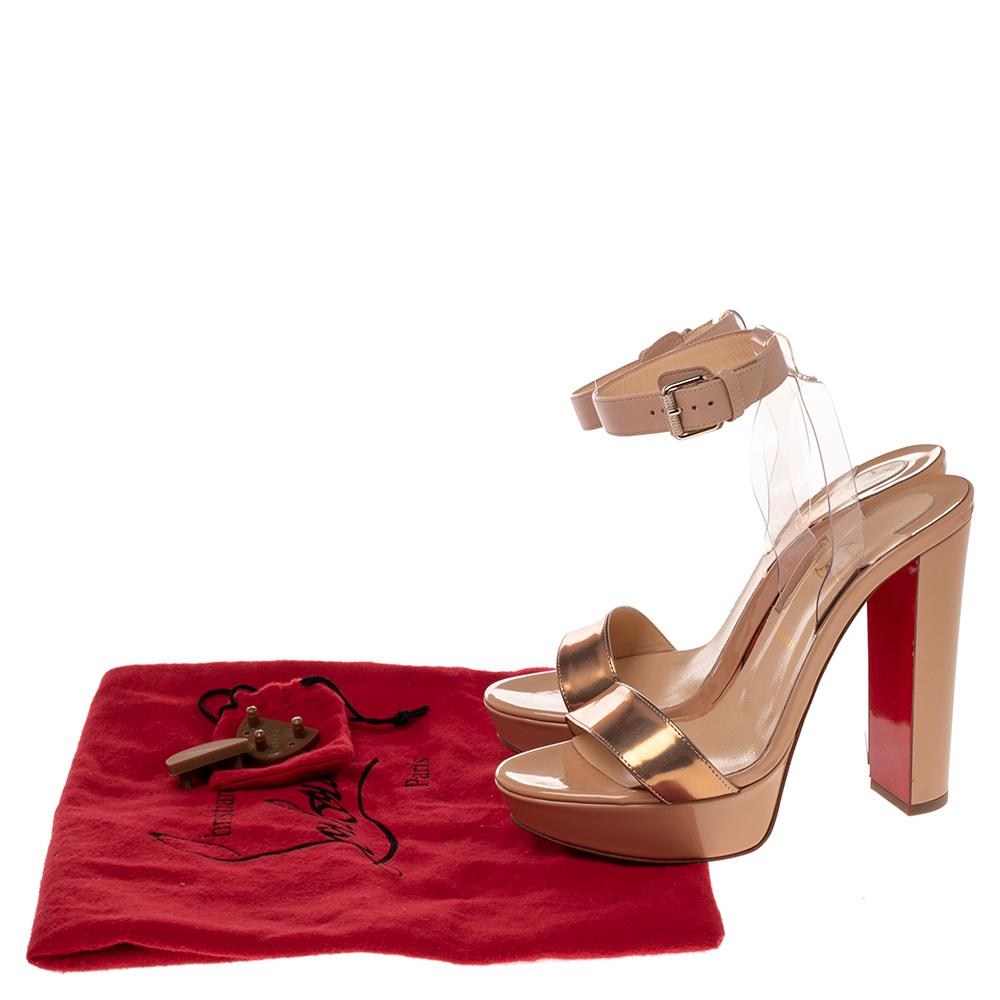 Skilfully crafted from leather with open toes, these Christian Louboutin sandals come ready to give you a high-fashion experience. The beige and bronze sandals, with a PVC strap on the ankles, are balanced on 13 cm heels and finished with the red