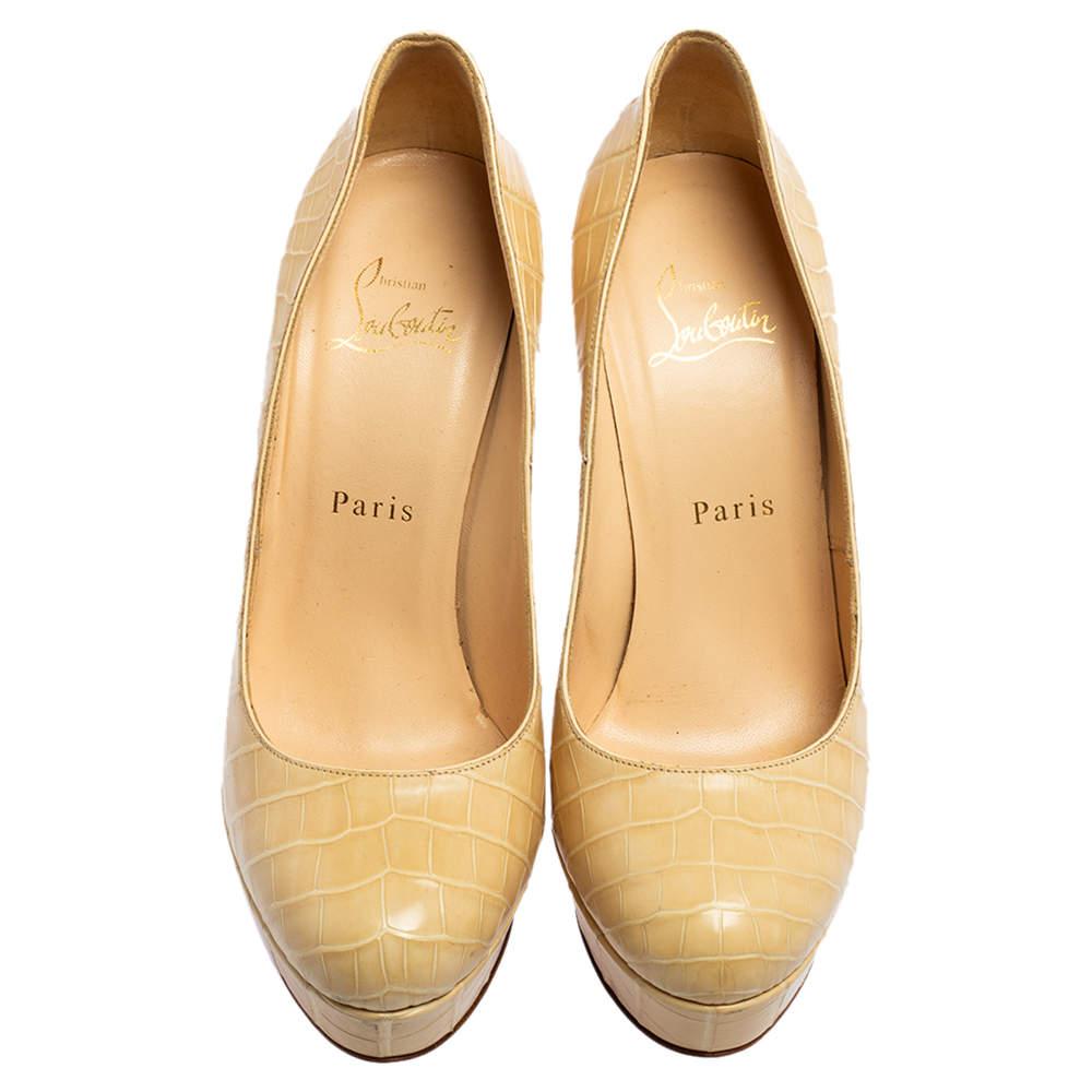 A classic to add to one's shoe collection is this pair. These Christian Louboutin beauties are covered in croc-embossed leather and styled with platforms, 13 cm heels, and the signature red soles. Add these pumps to your closet today and flaunt them