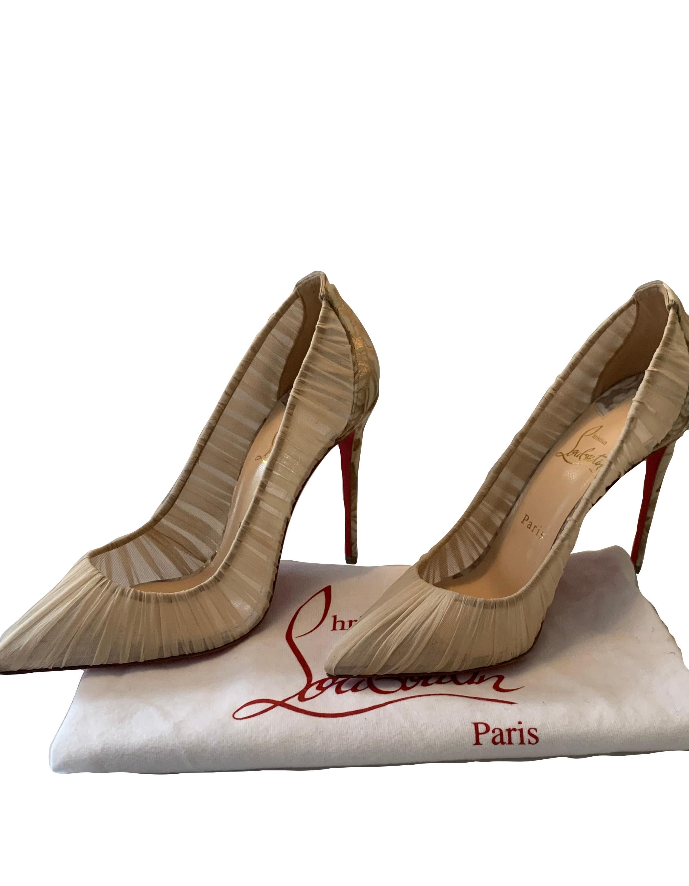 Christian Louboutin Beige Follie Draperia 100 High Heel Pumps sz 39.5.  Features rose design on back and heels of shoes.

Made In: Italy
Color: Beige
Materials: Chiffon
Overall Condition: Like new condition.  
Estimated Retail: $795 plus