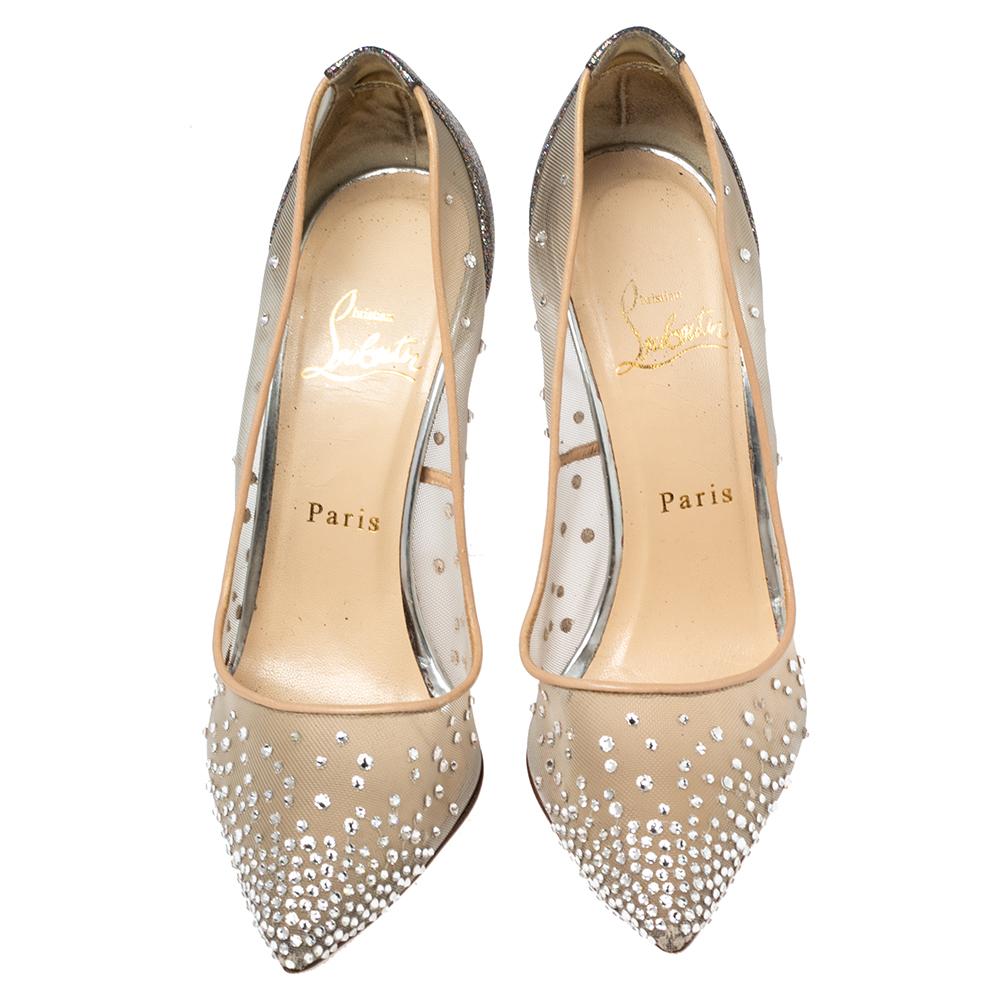 Dazzle the crowds and make a statement like never before in these gorgeous Follies Strass pumps from Christian Louboutin! The pumps have been crafted from mesh into a pointed toe style. They are exquisitely embellished with crystals on the exterior