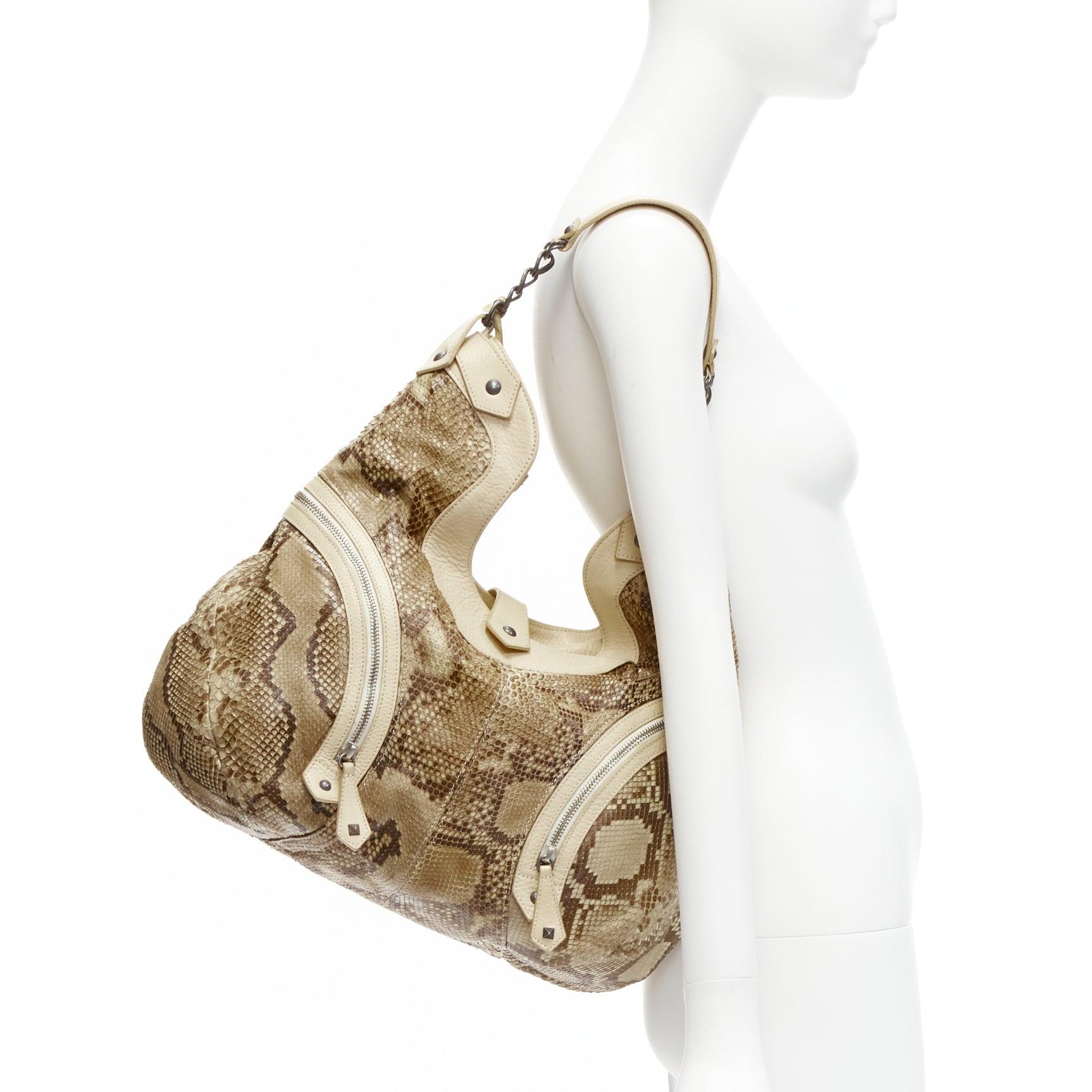 CHRISTIAN LOUBOUTIN beige khaki scaled leather biker zip chain hobo bag
Reference: TGAS/D00550
Brand: Christian Louboutin
Material: Leather
Color: Beige, Khaki
Pattern: Animal Print
Closure: Zip
Lining: Red Fabric
Made in:
