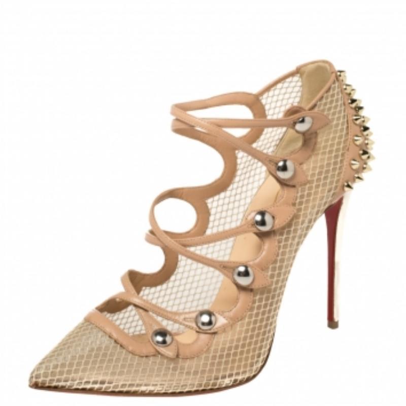 Unparalleled craftsmanship in shoemaking is what describes Christian Louboutin in the best way. To justify that, we bring you these stunning sandals. Crafted from beige leather and mesh, the strappy silhouette is adorned with pointed-toes and spikes